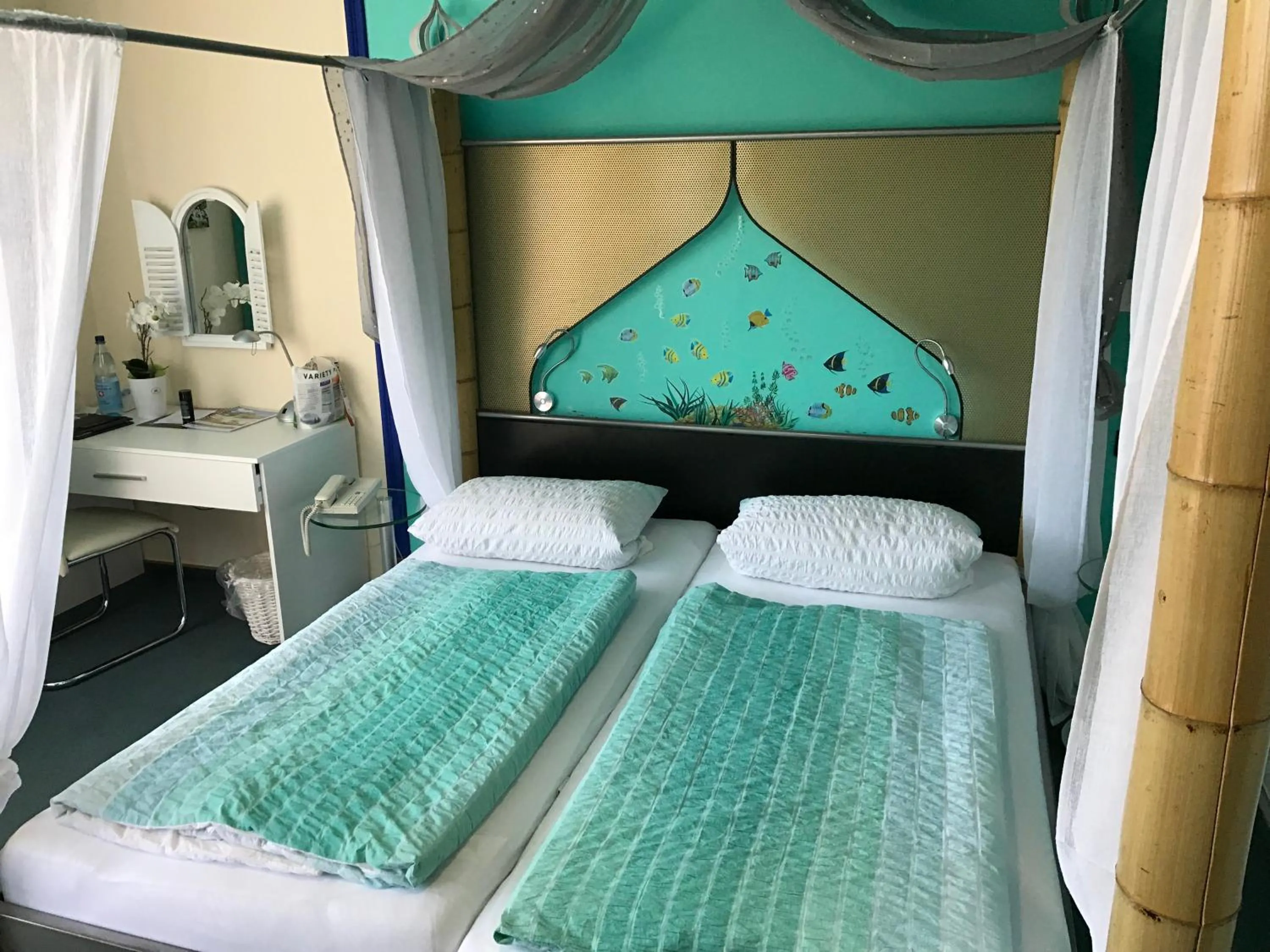 Photo of the whole room, Bed in Themen Hotel Terrassen Cafe