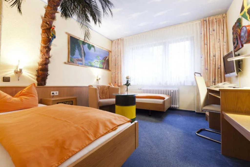 Photo of the whole room, Bed in Themen Hotel Terrassen Cafe