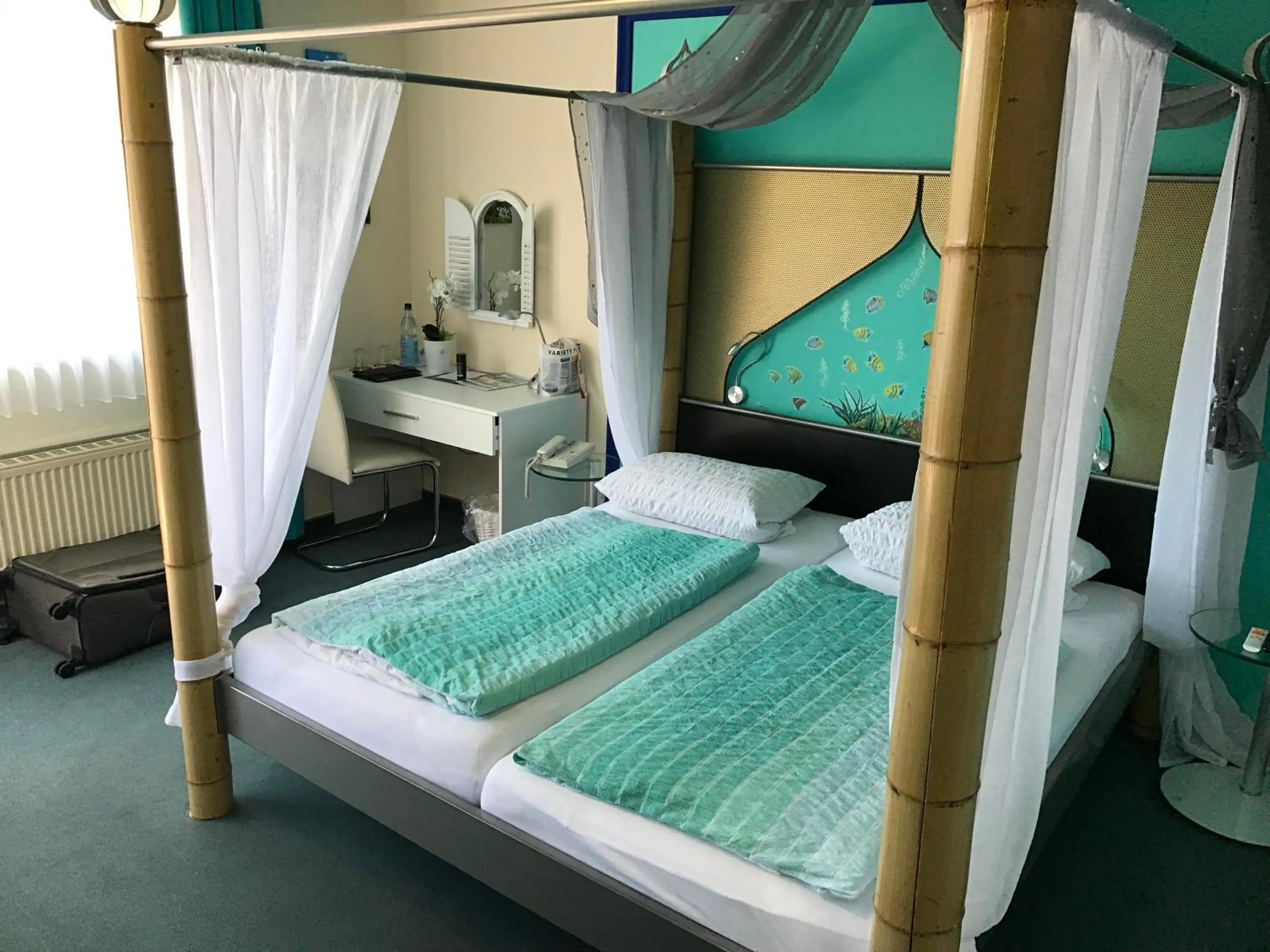 Photo of the whole room, Bed in Themen Hotel Terrassen Cafe