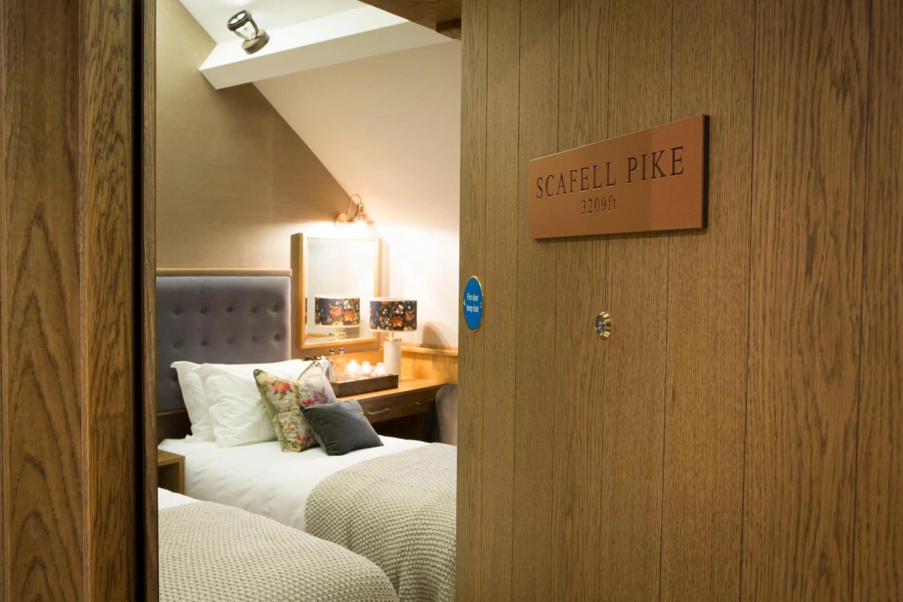 Bed in The Queen's Head Hotel