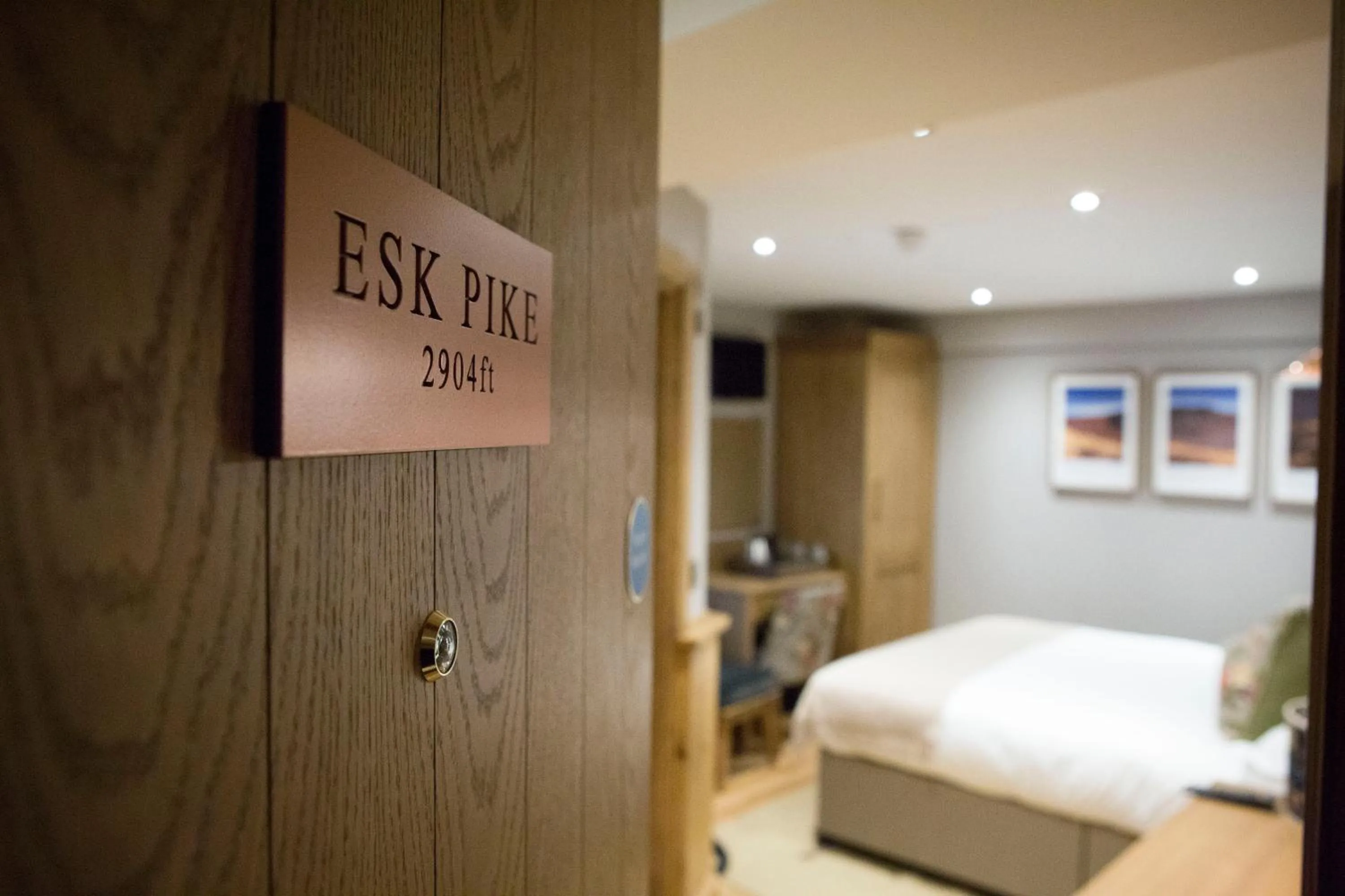 Bed in The Queen's Head Hotel