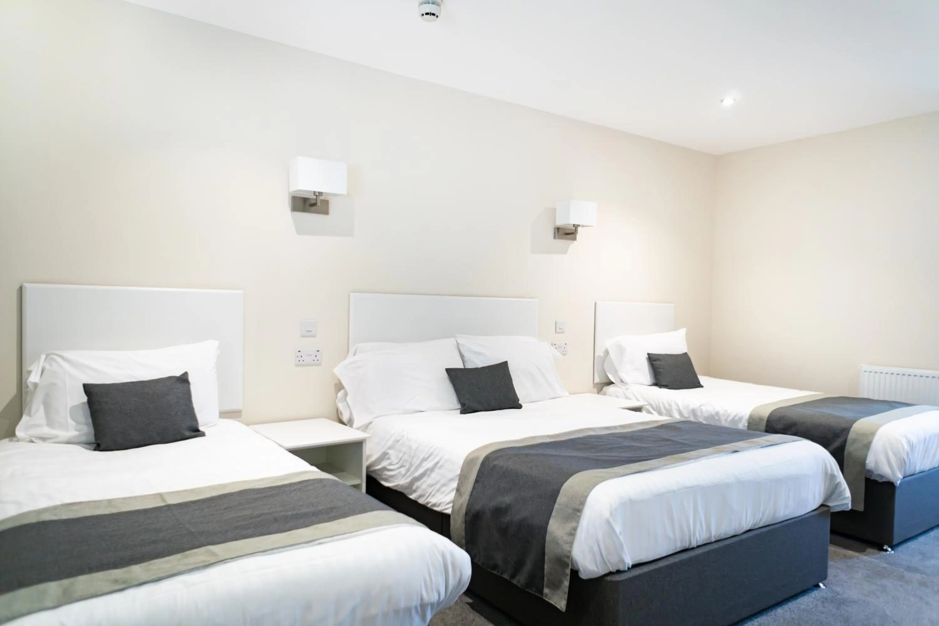 Bed in The Appleby Inn Hotel