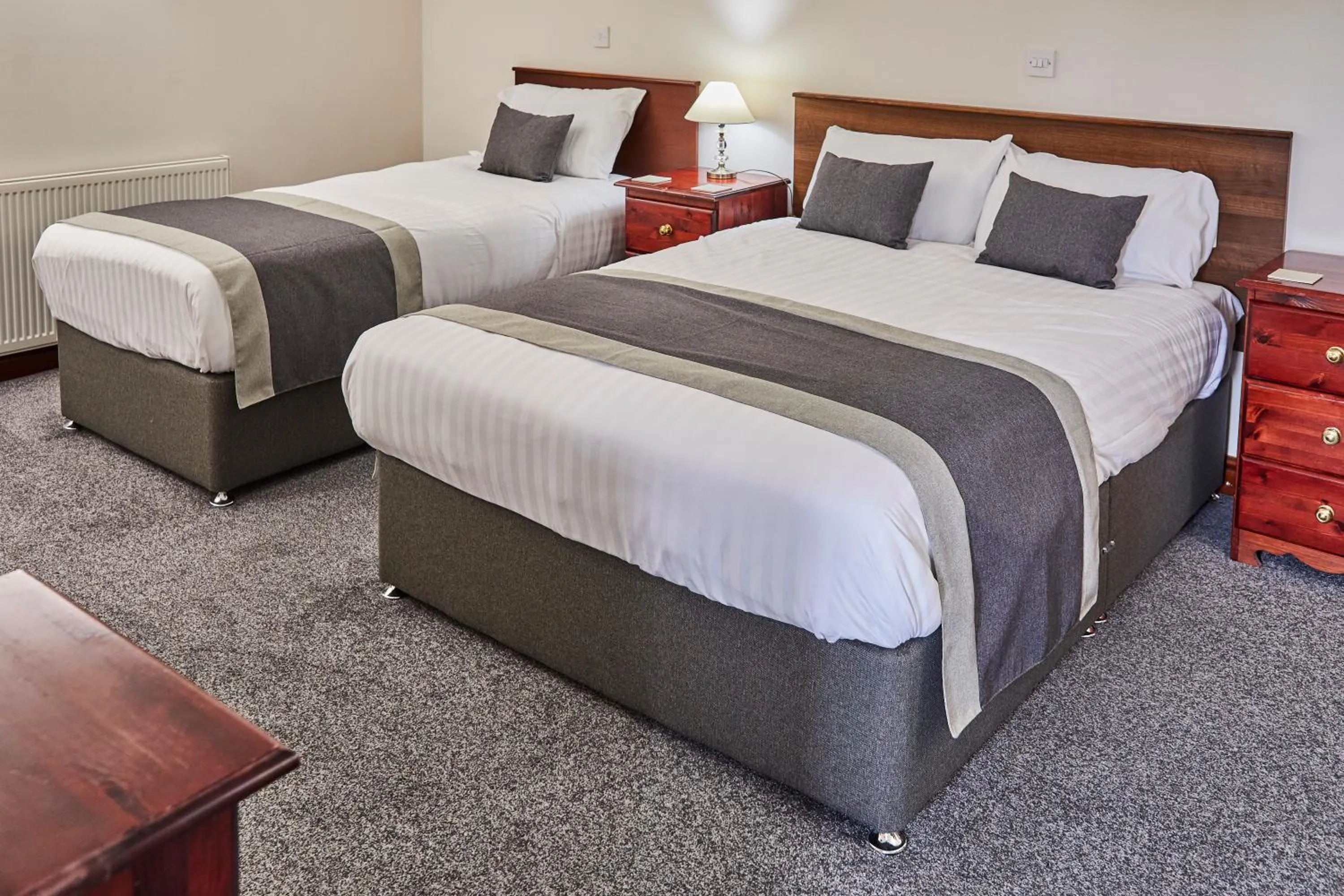 Bed in The Appleby Inn Hotel