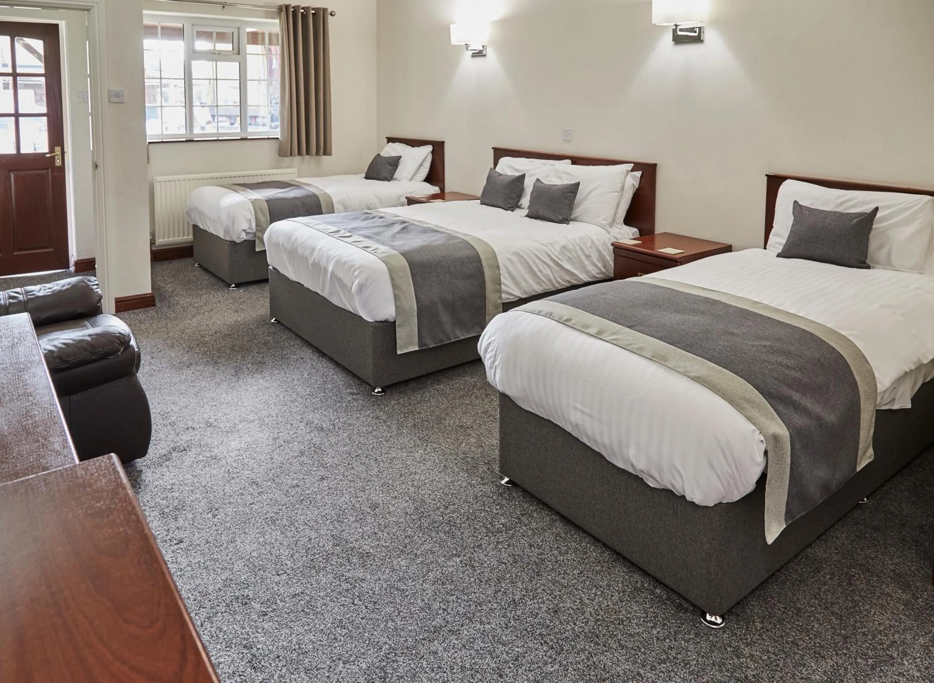 Bed in The Appleby Inn Hotel