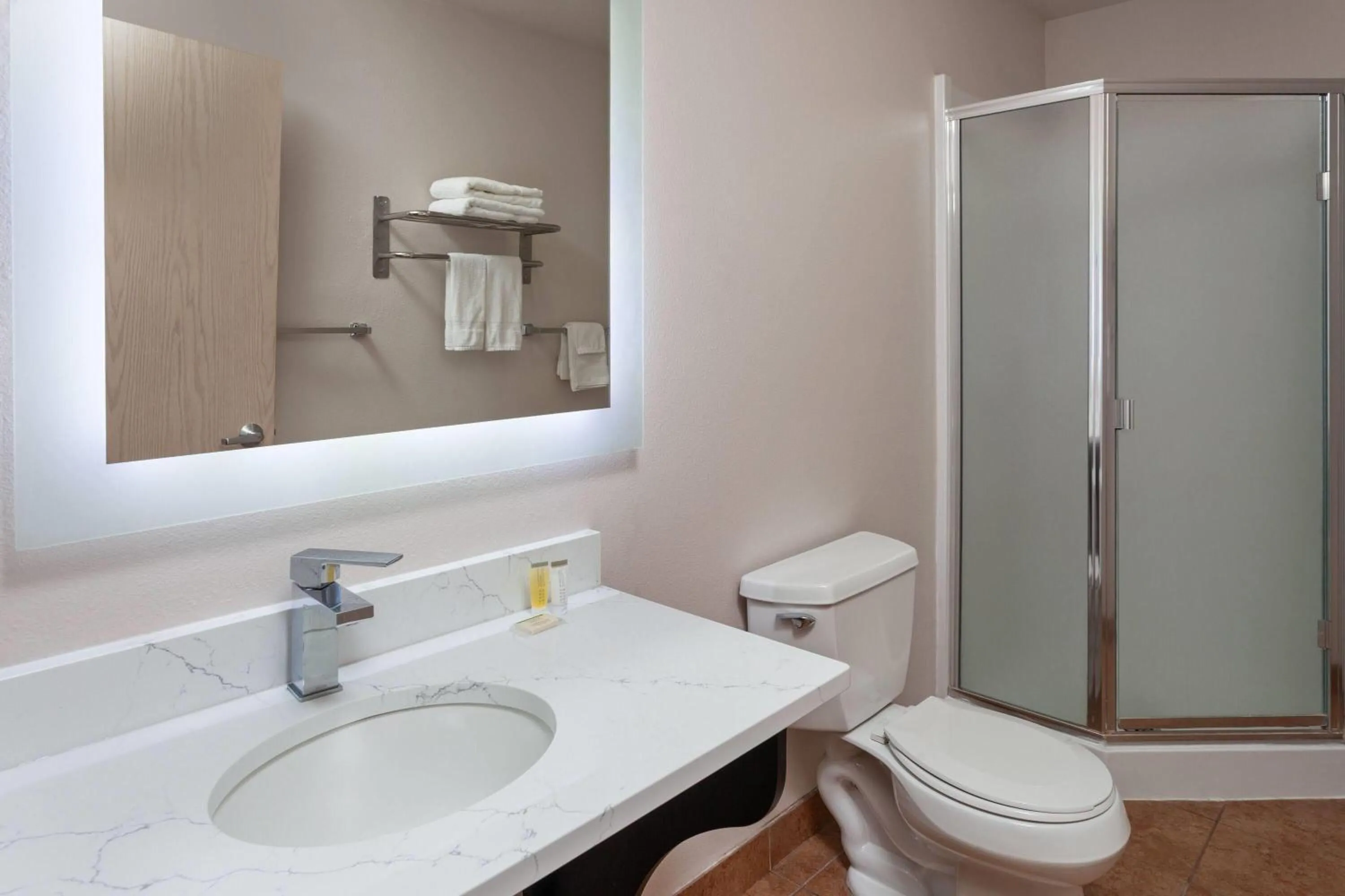 Bathroom in Days Inn & Suites by Wyndham Spokane Airport Airway Heights
