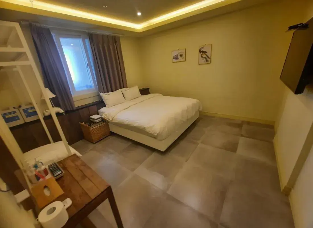 Bed in SongJeong Lesign Hotel Bed in SongJeong Lesign Hotel