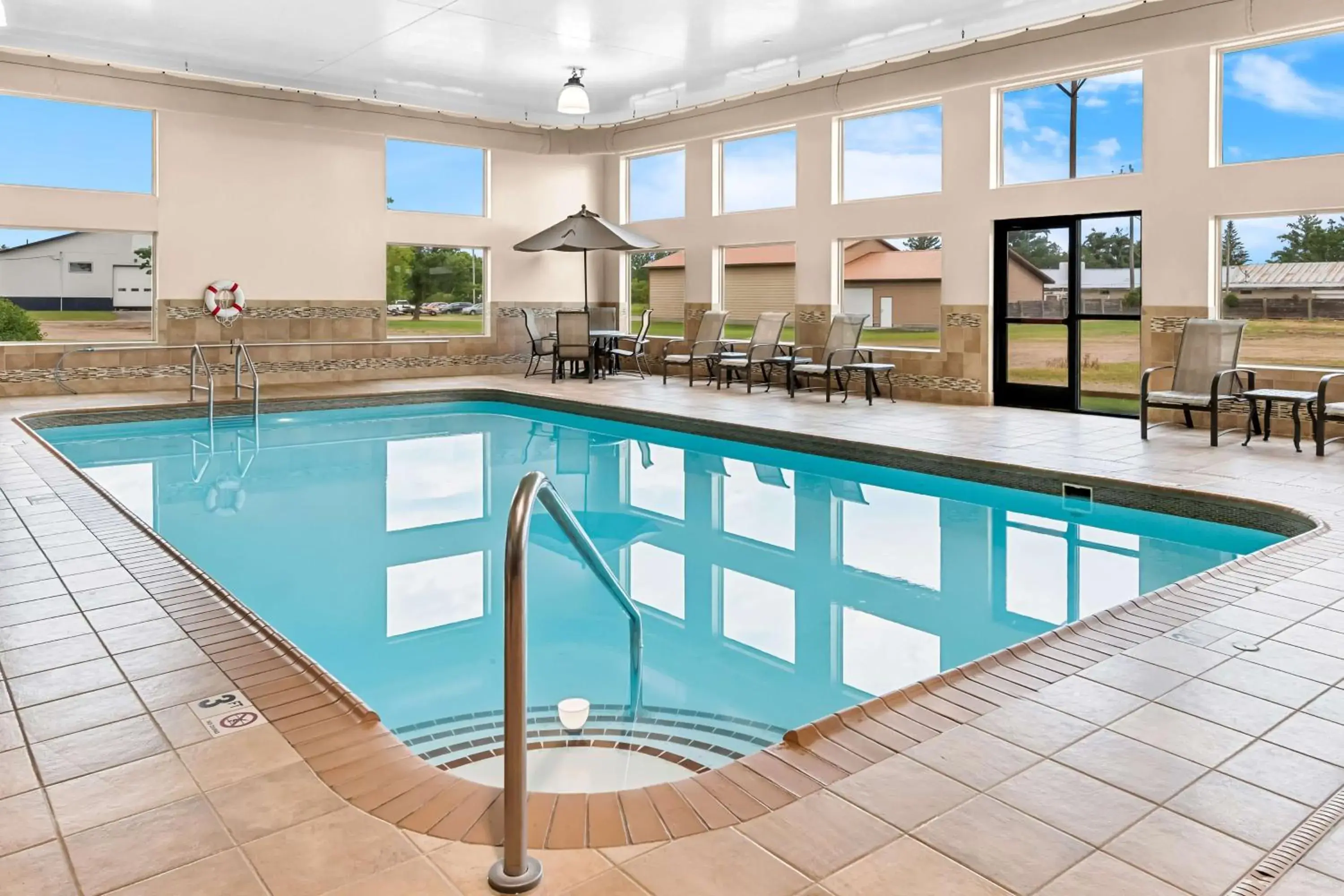 Pool view in Heartland Inn & Suites, SureStay Collection by Best Western Pool view in Heartland Inn & Suites, SureStay Collection by Best Western