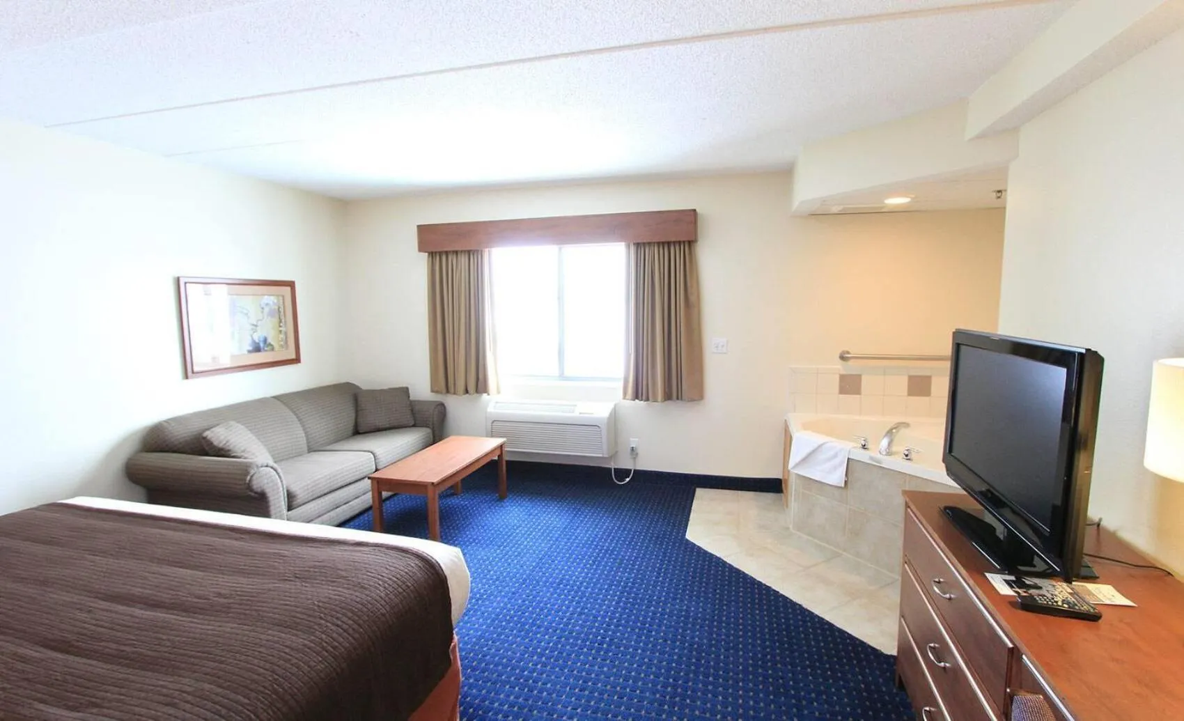 Photo of the whole room in AmericInn by Wyndham Cedar Rapids Airport