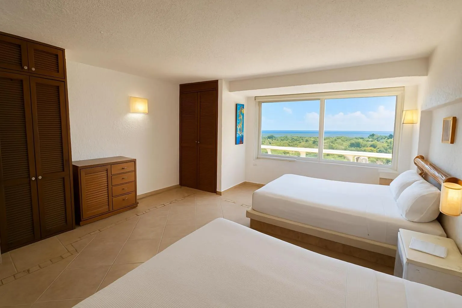 Bed in Beach Front Condos in Hotel Zone