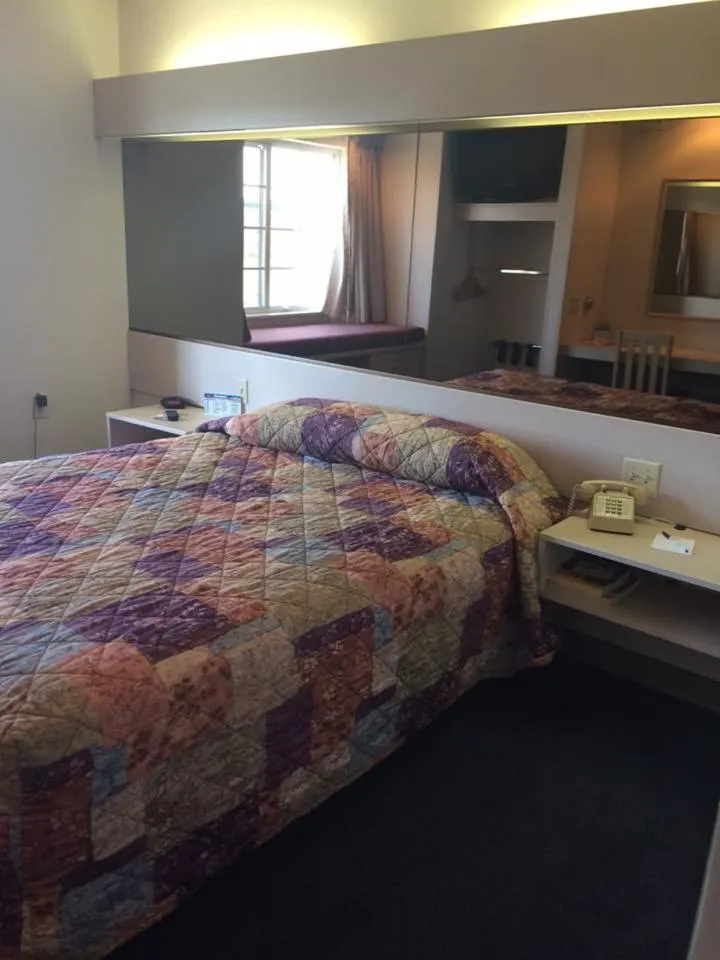 Bed in Microtel Inn by Wyndham Champaign