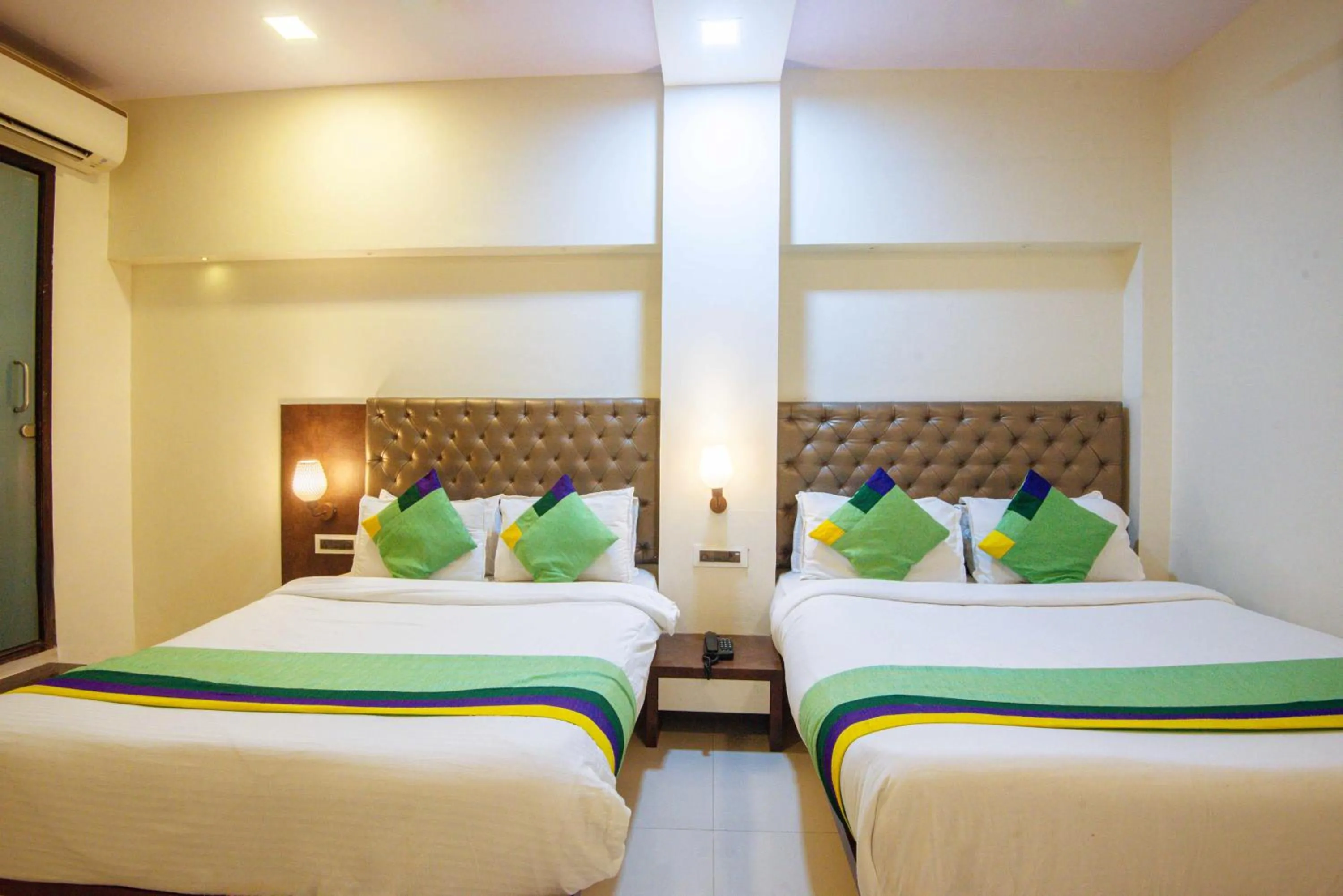 Bedroom, Bed in Treebo Blue Moon Powai