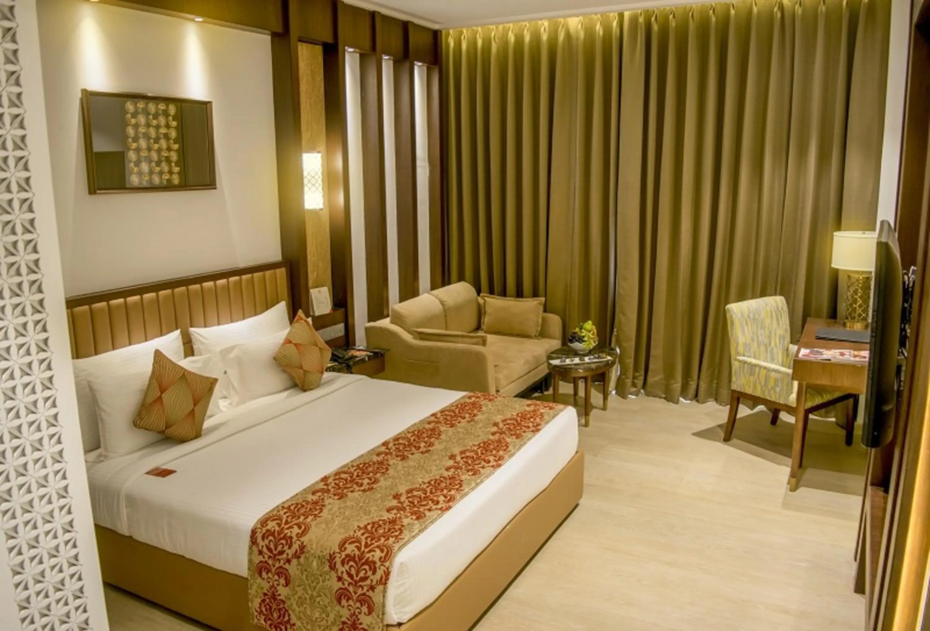 Bed in The Corinthians Resort