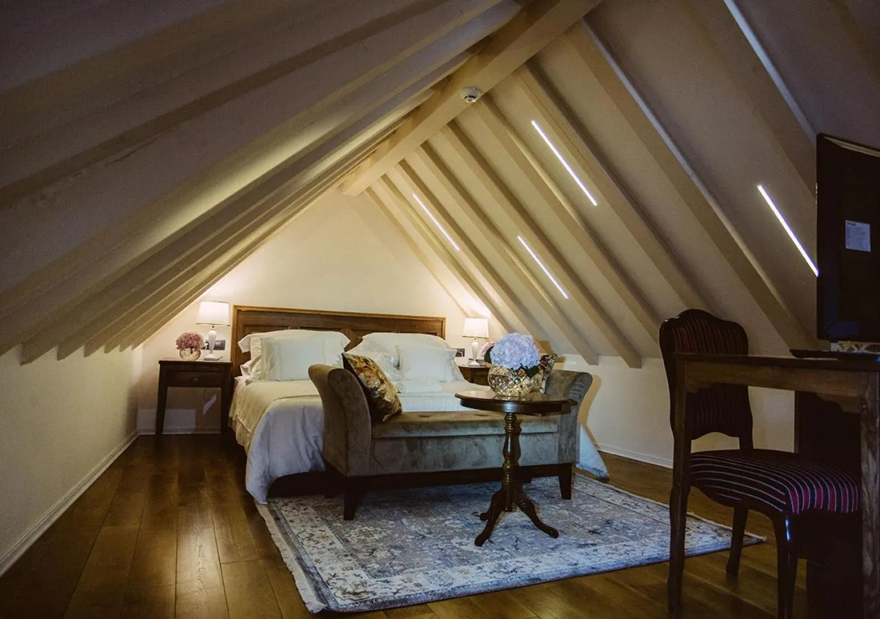 Bed in Heritage Hotel Cardo