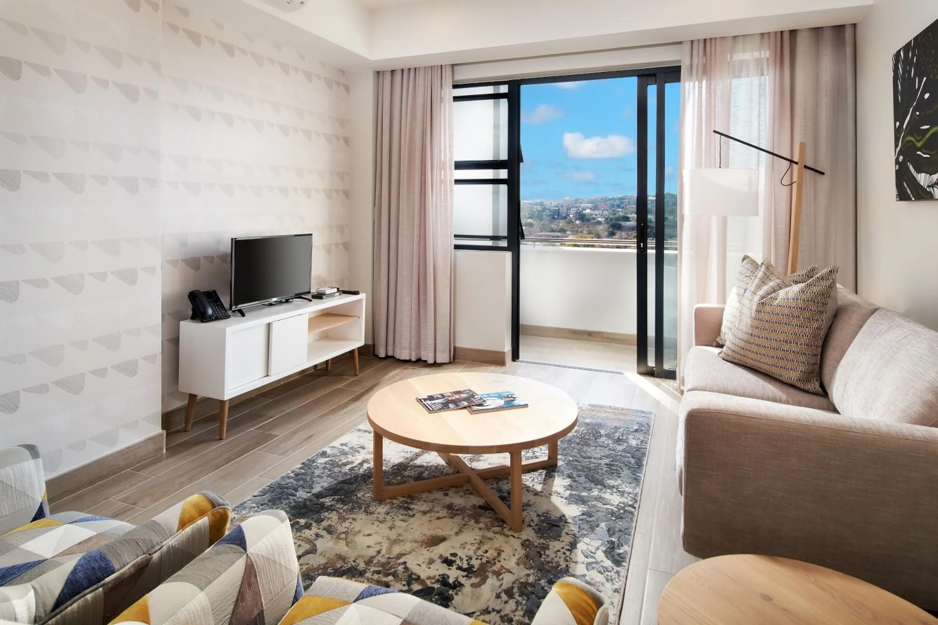 Living room in The Regency Apartment Hotel Menlyn