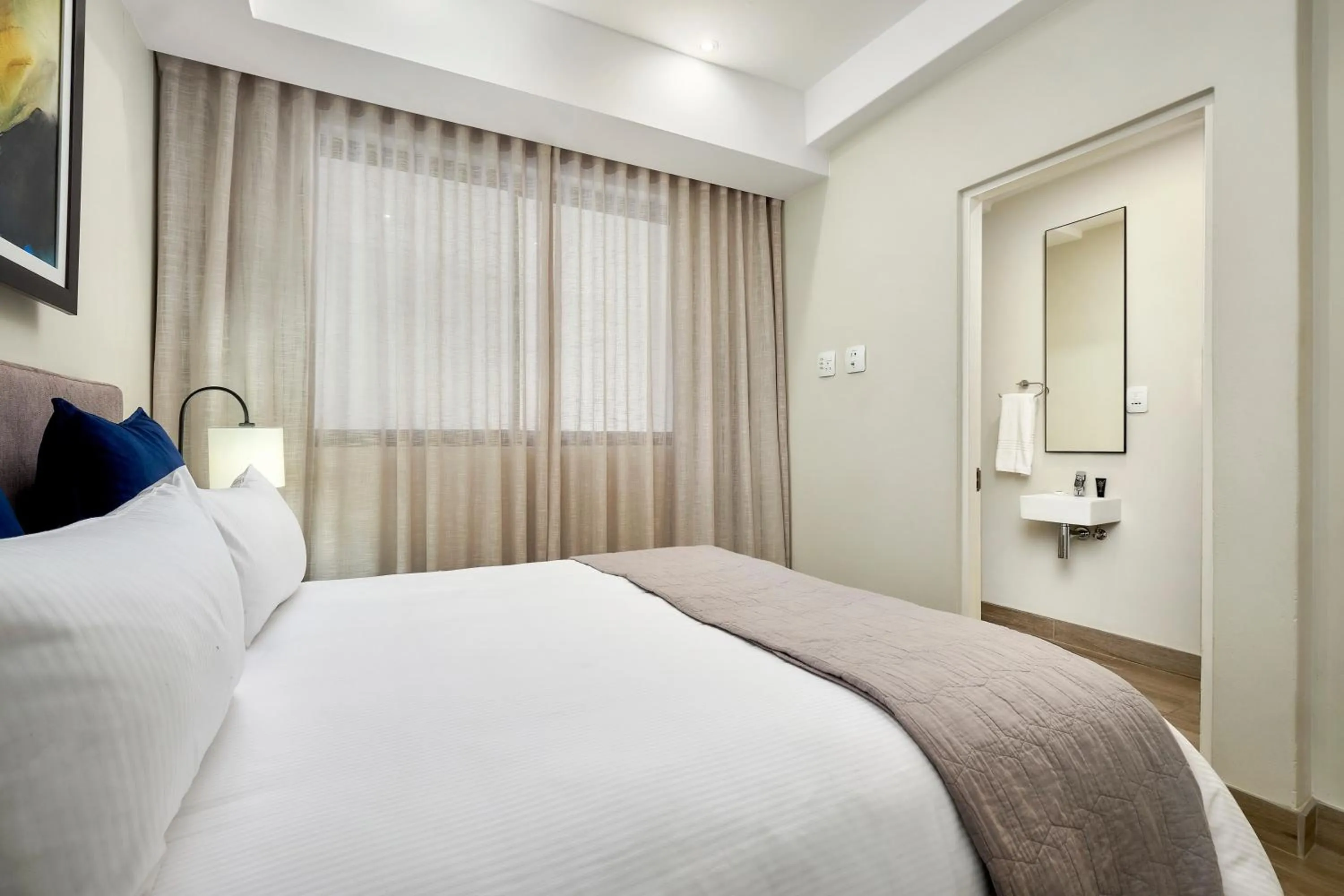 Bedroom in The Regency Apartment Hotel Menlyn