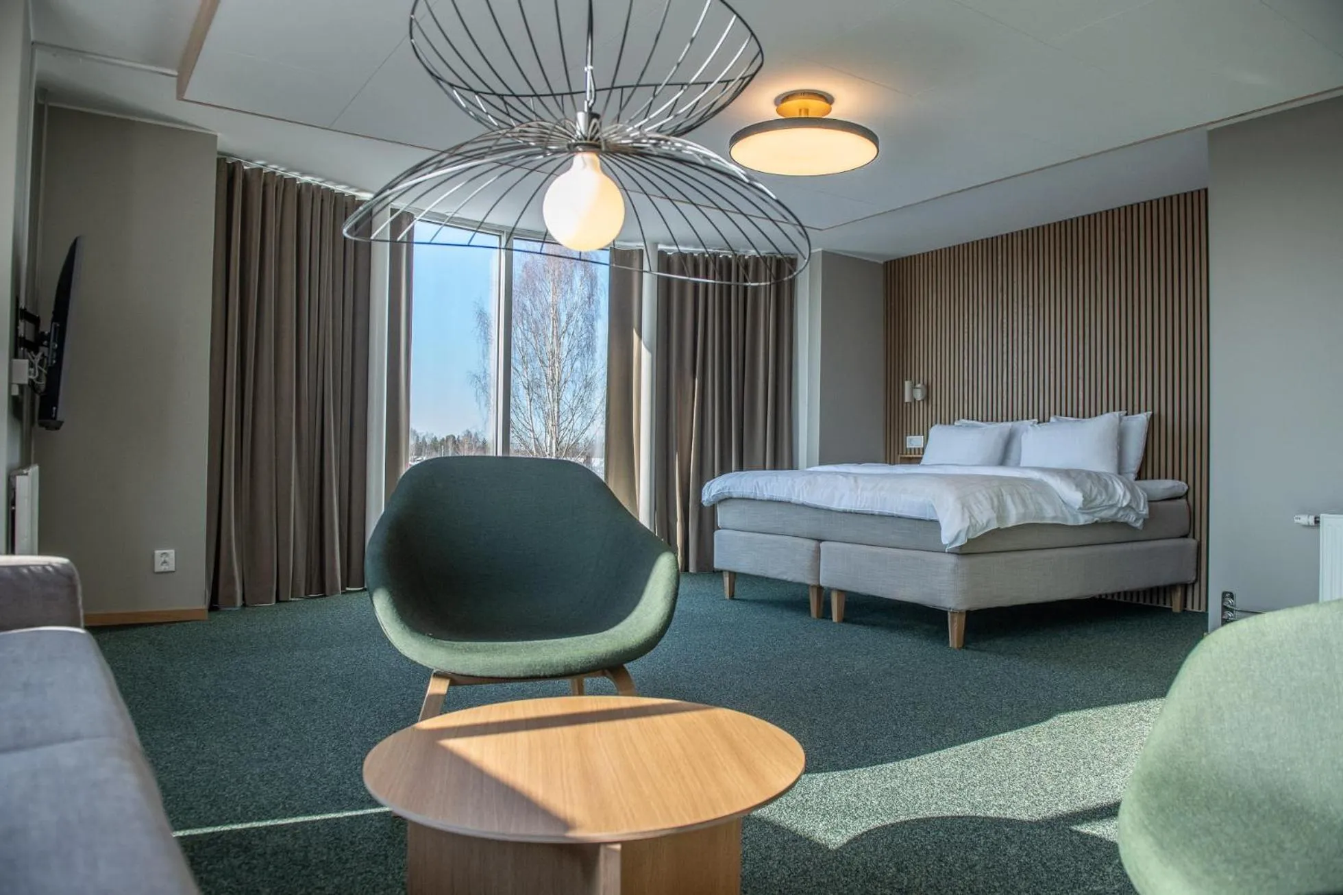 Seating area, Bed in Medlefors Hotell & Konferens