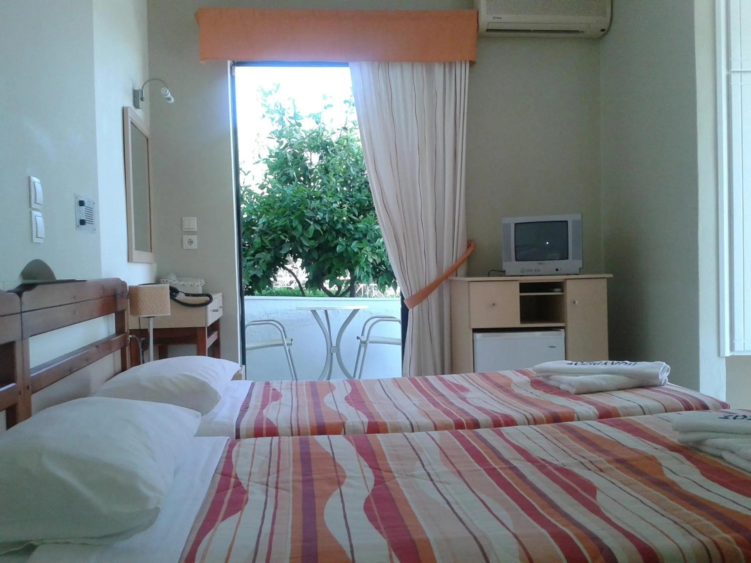 Photo of the whole room, Bed in Polyrizos Hotel
