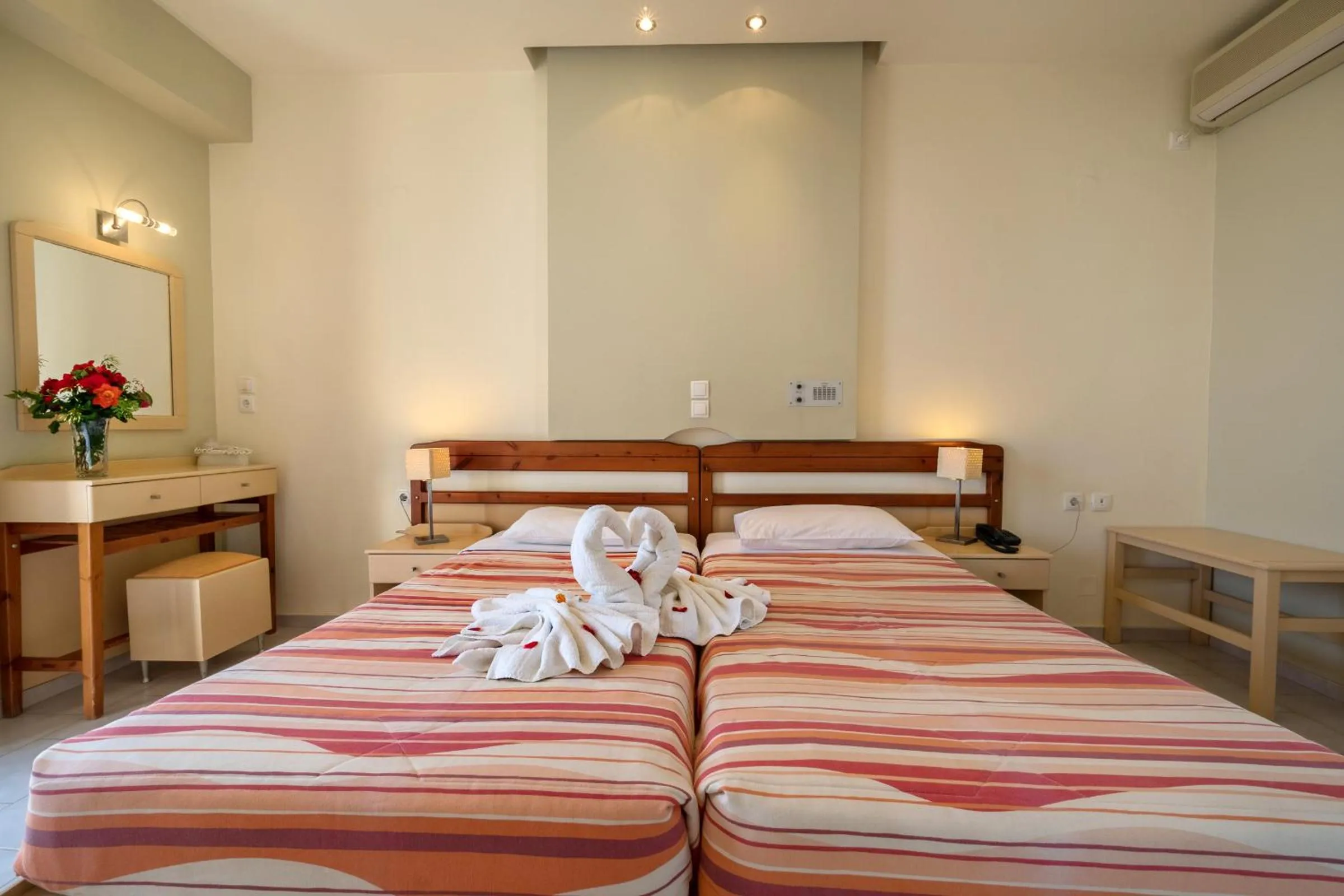 Bed in Polyrizos Hotel