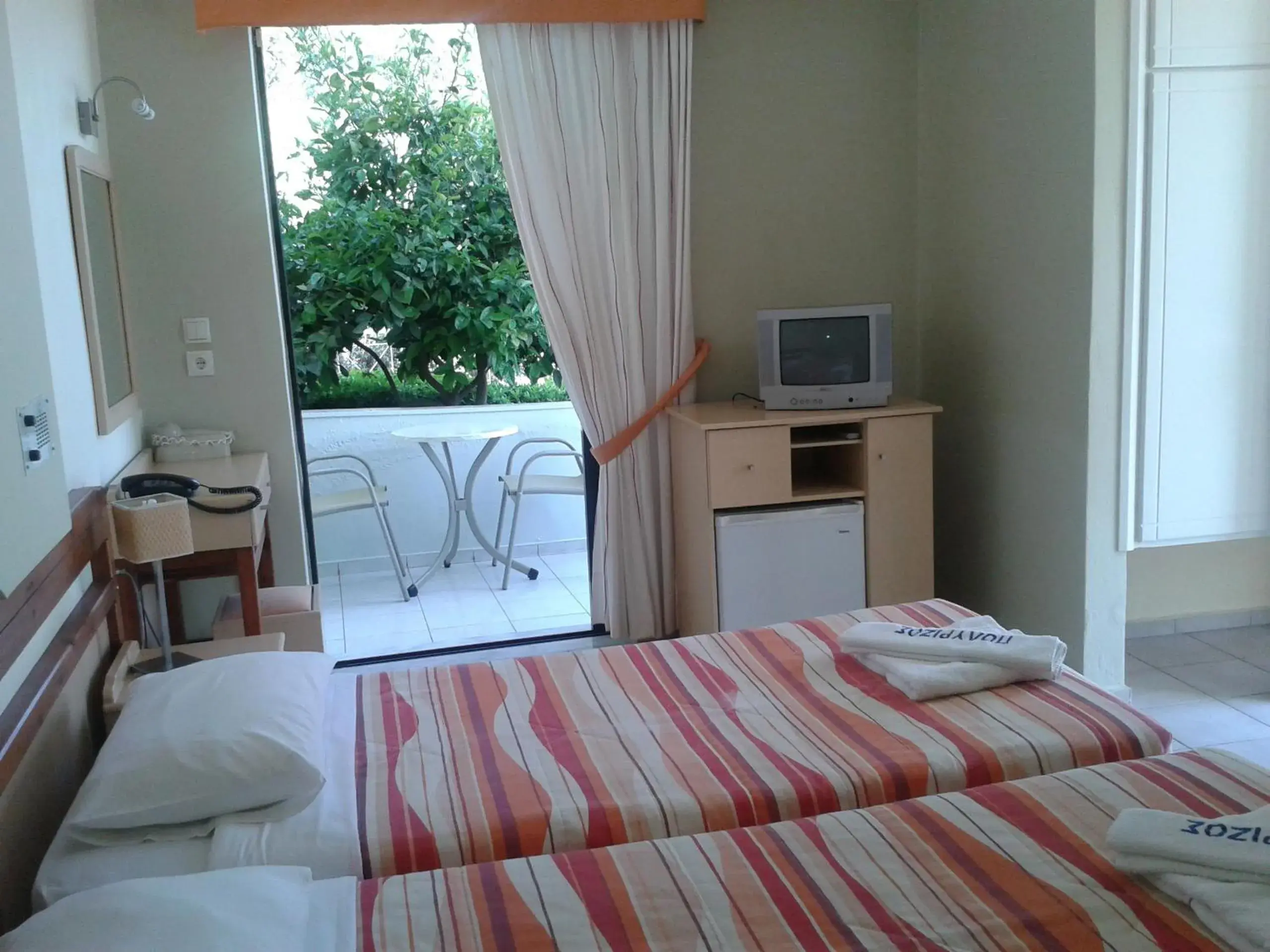 Double or Twin Room with Garden View in Polyrizos Hotel Double or Twin Room with Garden View in Polyrizos Hotel