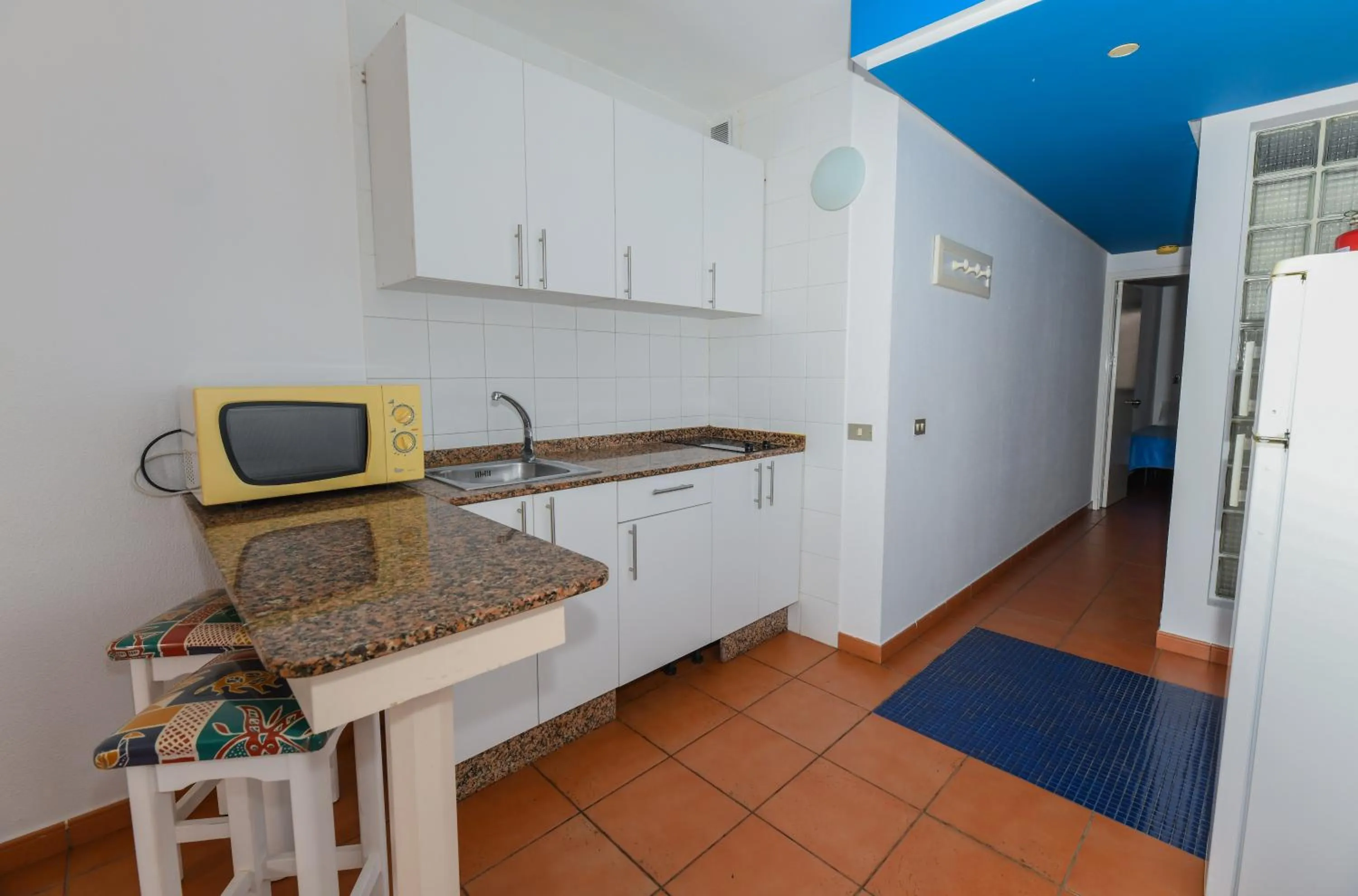 Kitchen or kitchenette in Apartamentos LIVVO Puerto Bello