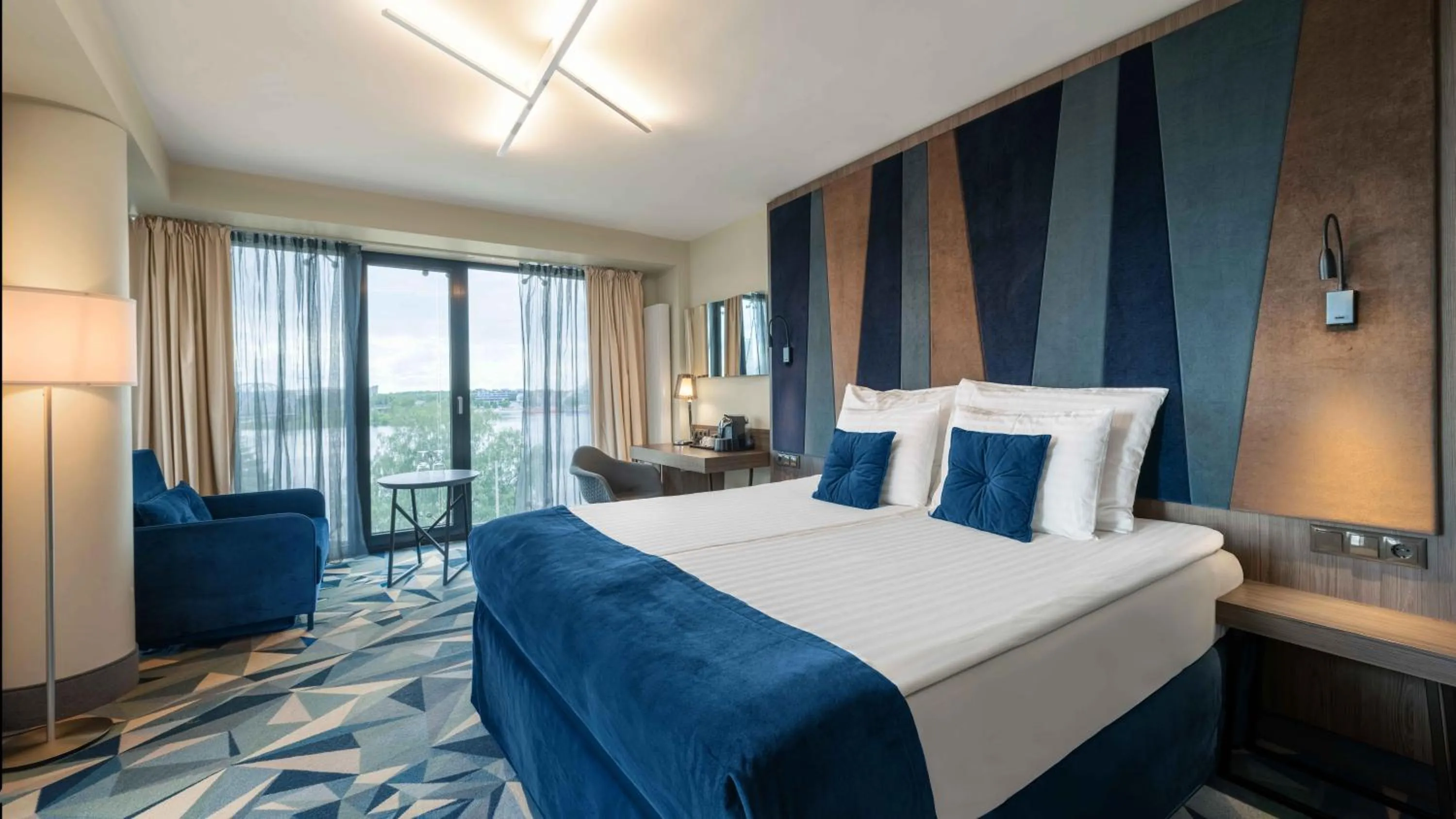 Bed in Wellton Riverside SPA Hotel