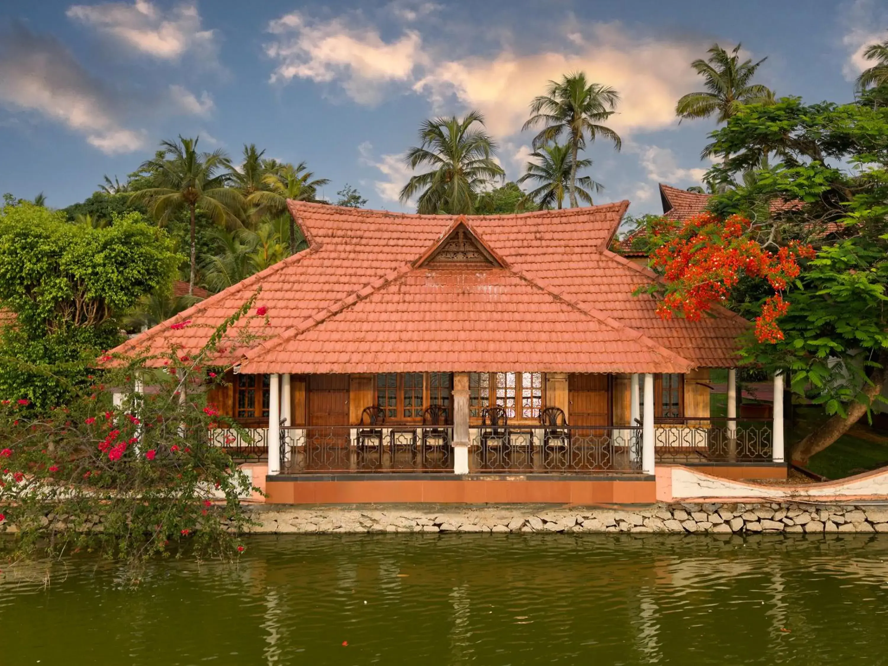 Water Front Heritage Cottage with Balcony in Sterling Lake Palace Alleppey Water Front Heritage Cottage with Balcony in Sterling Lake Palace Alleppey