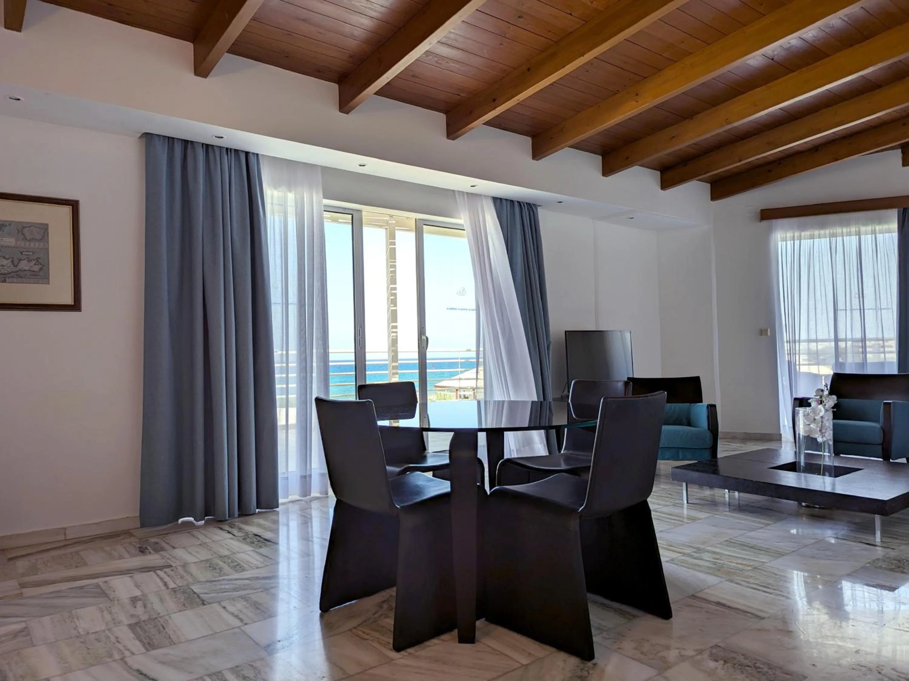 Living room in Apollonia Beach Resort & Spa