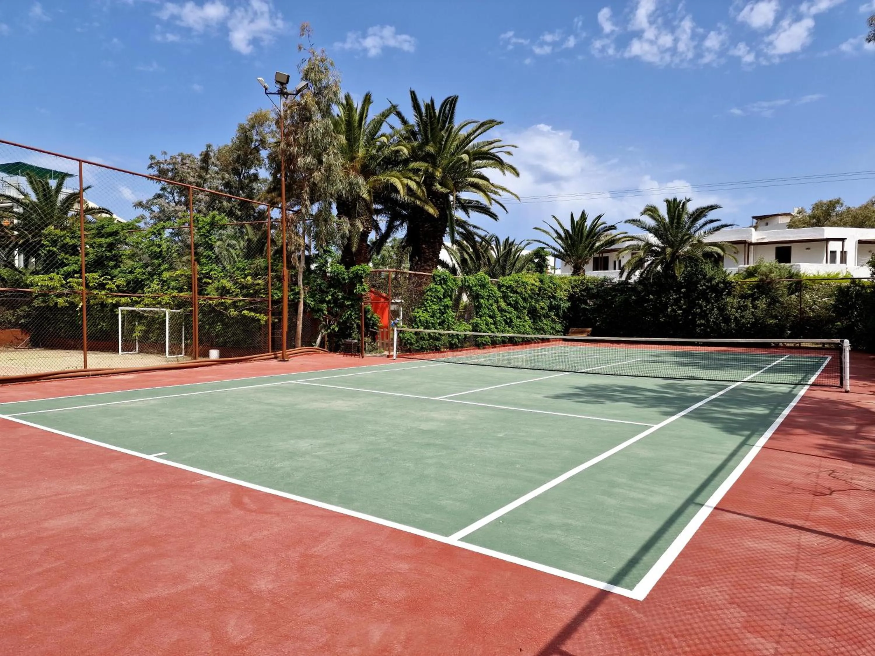 Tennis court in Apollonia Beach Resort & Spa