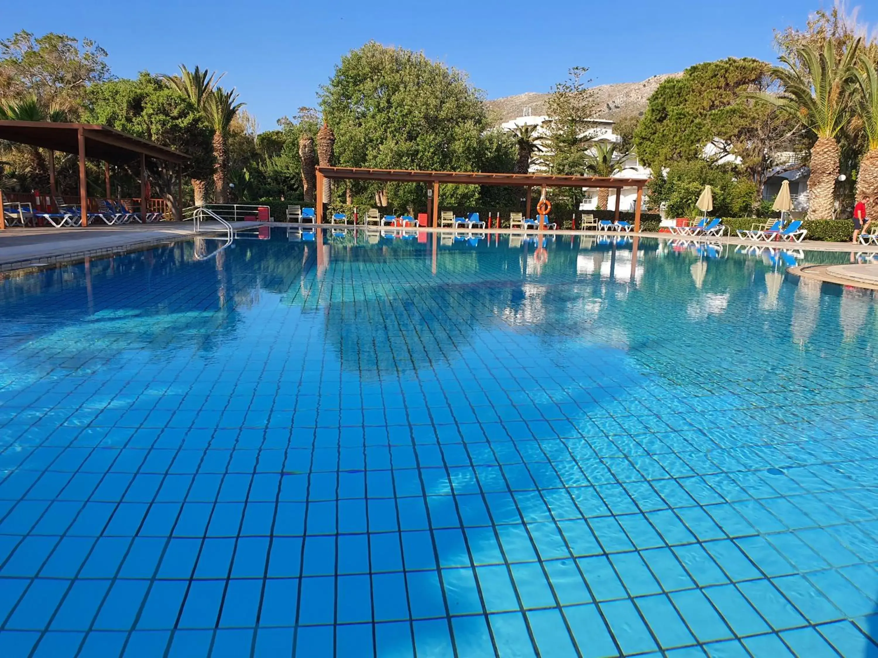 Swimming pool in Apollonia Beach Resort & Spa Swimming pool in Apollonia Beach Resort & Spa