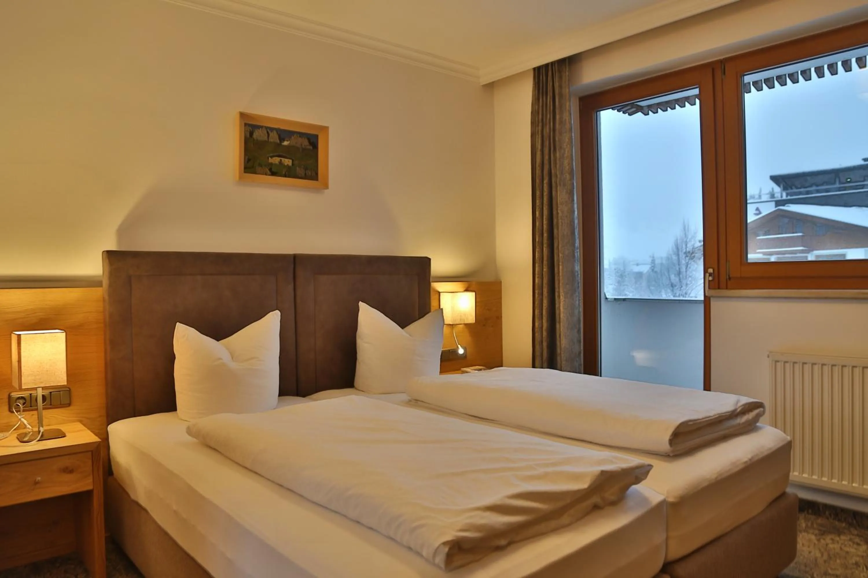 Bed in Aparthotel Acksteiner