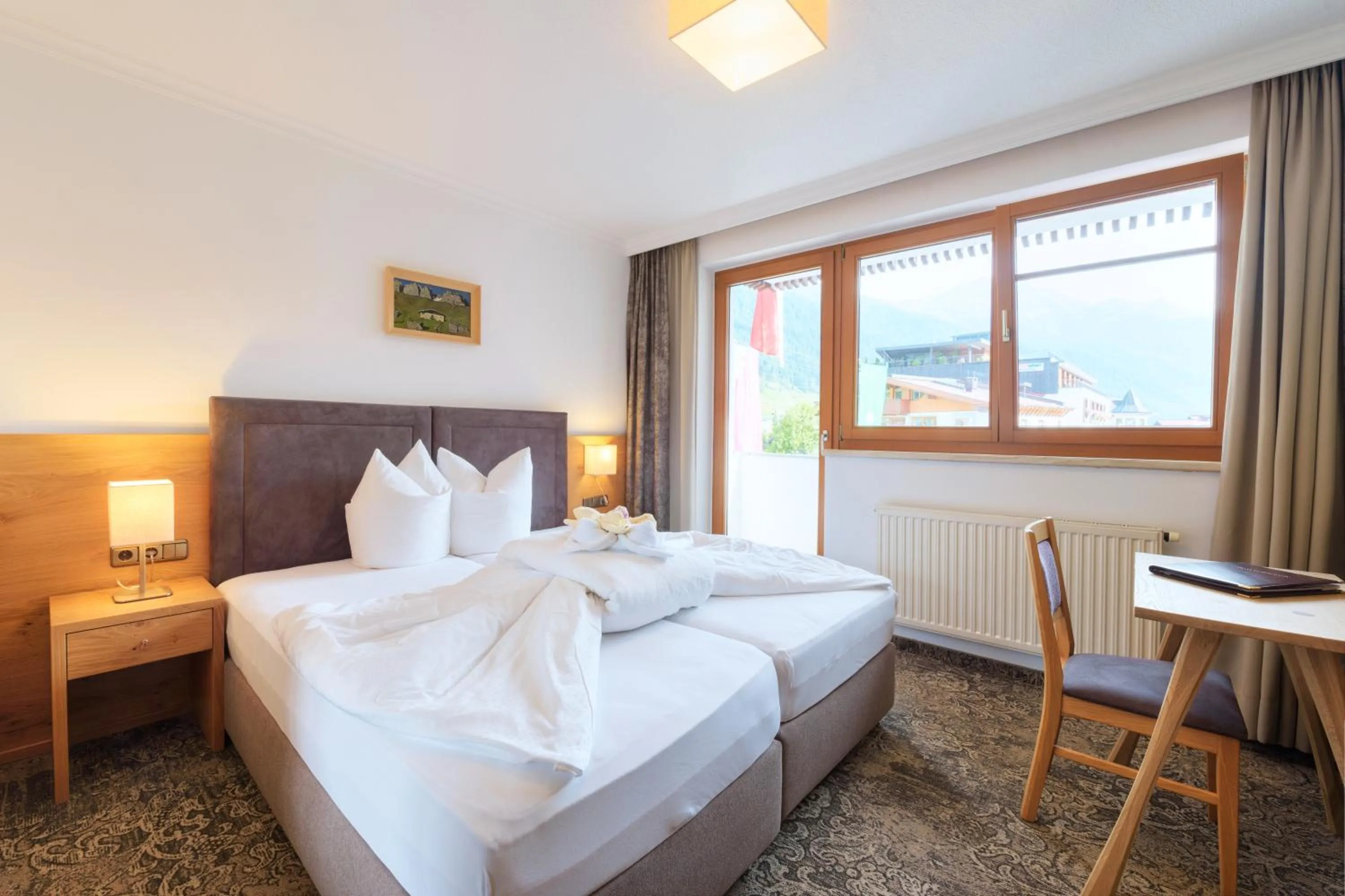 Bed in Aparthotel Acksteiner