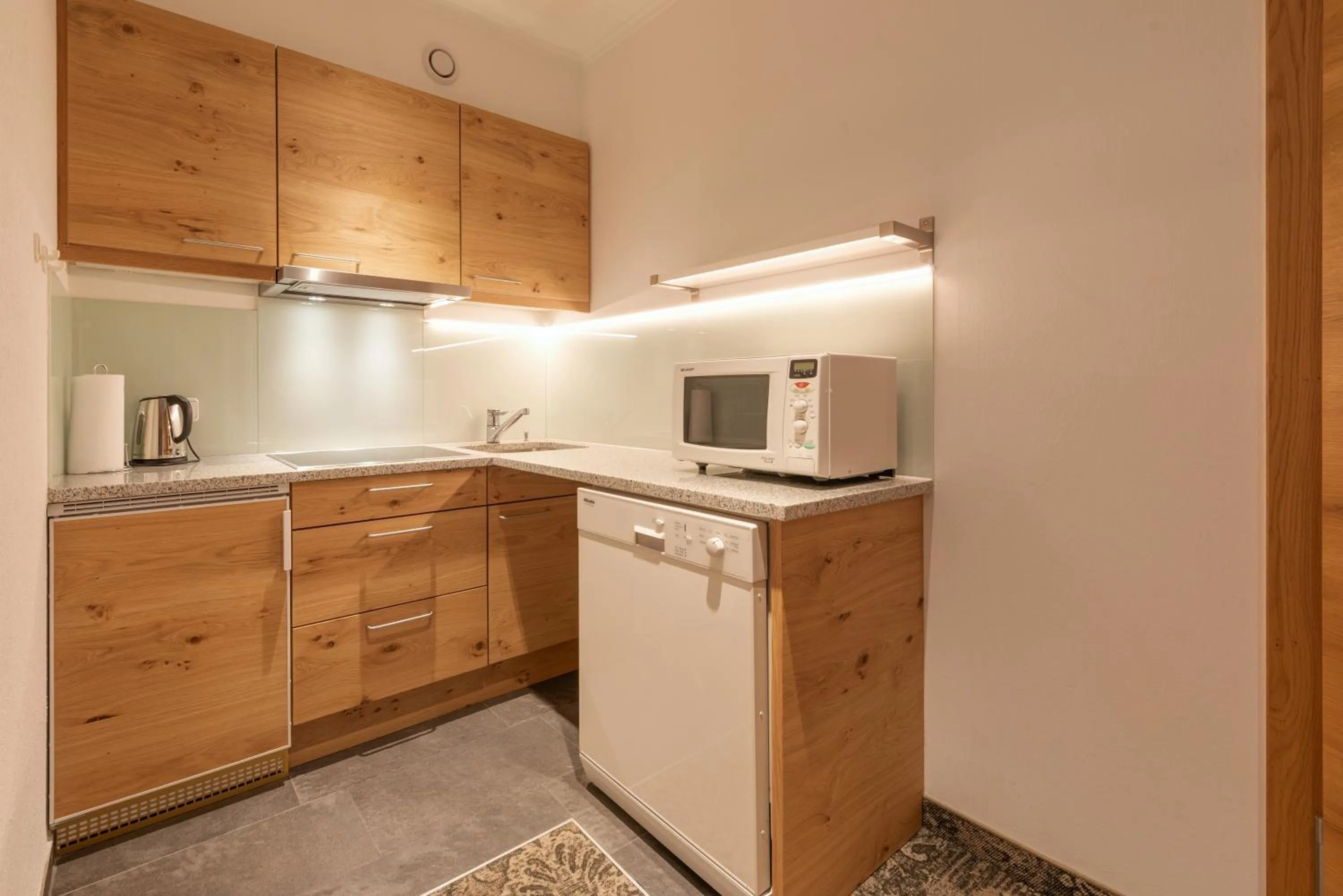 Kitchen or kitchenette in Aparthotel Acksteiner