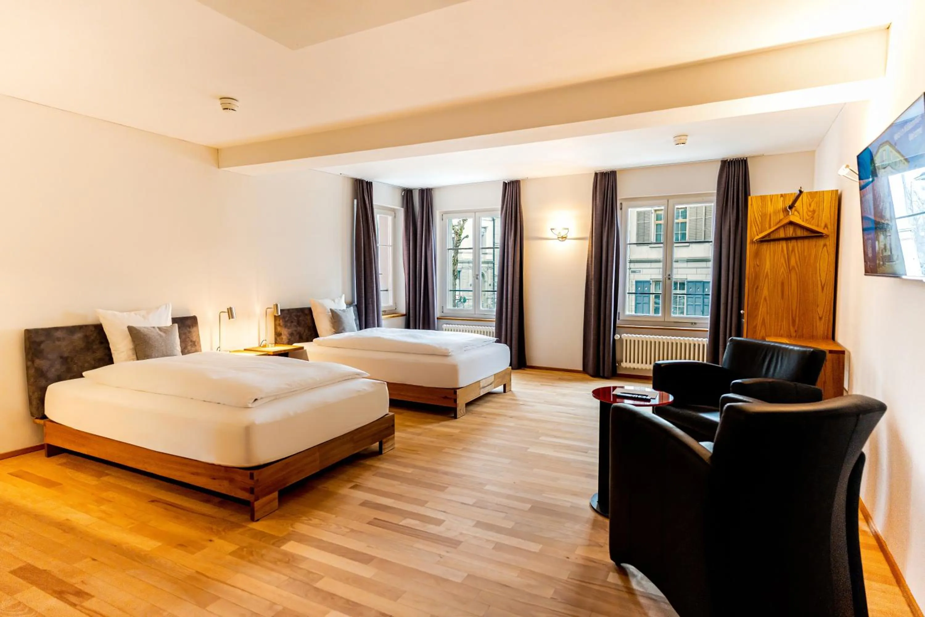 Bed in Hotel Le Lion - Self Check-in