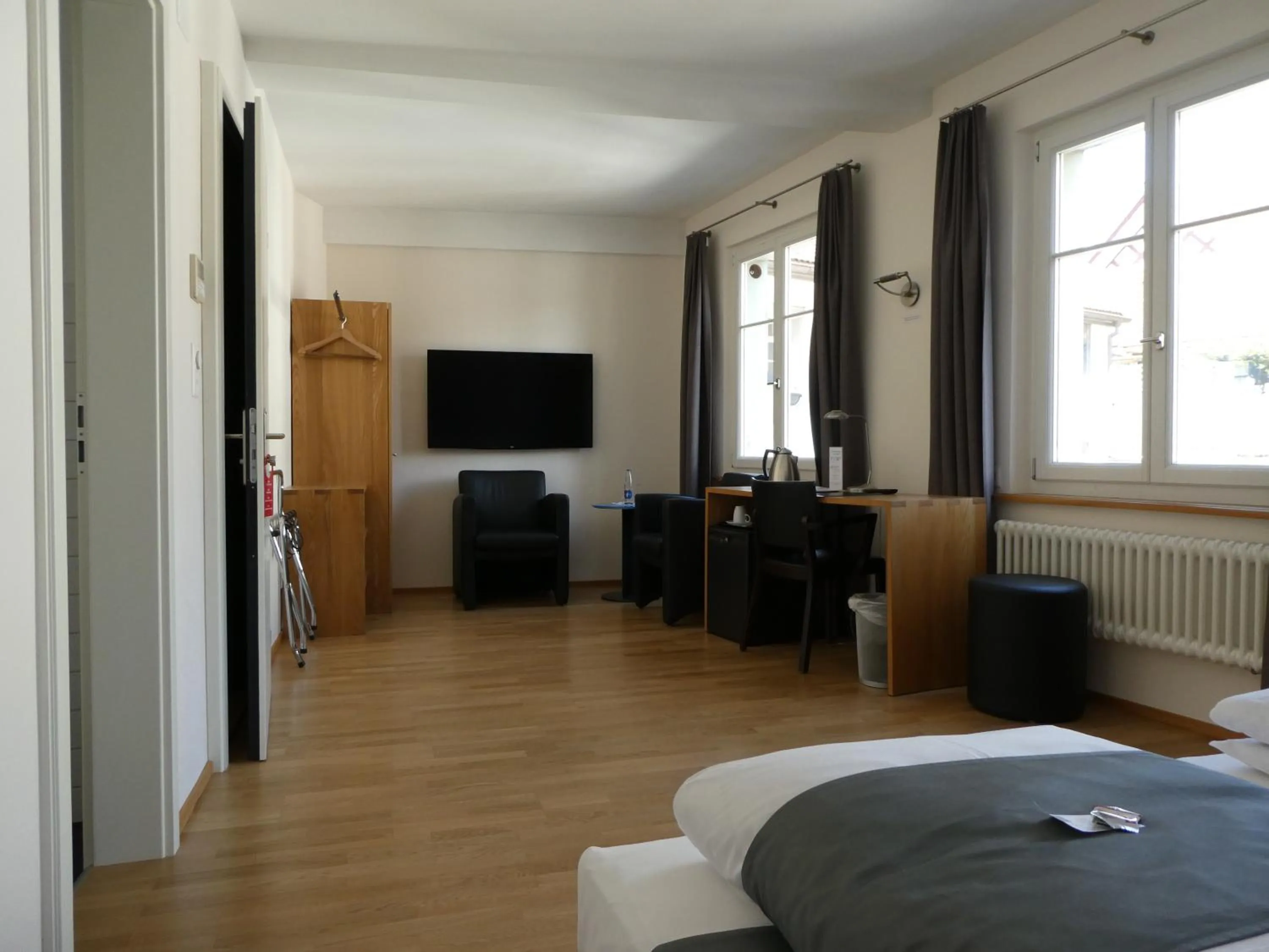 Bed in Hotel Le Lion - Self Check-in