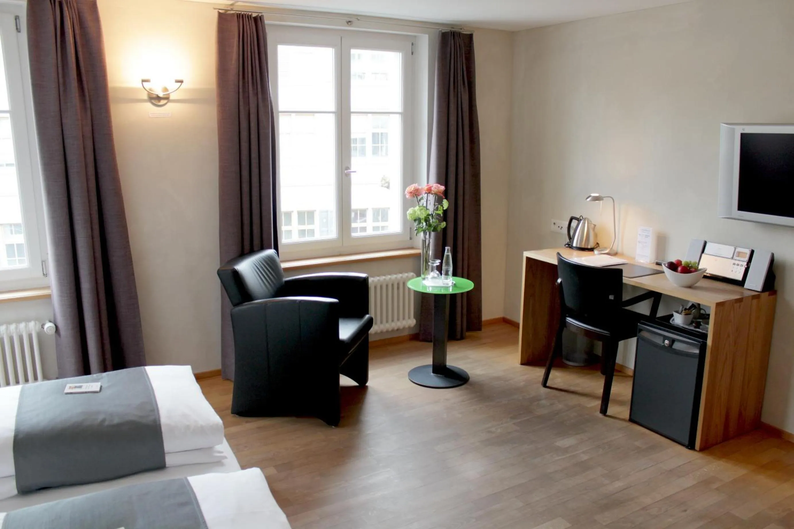 Bed in Hotel Le Lion - Self Check-in