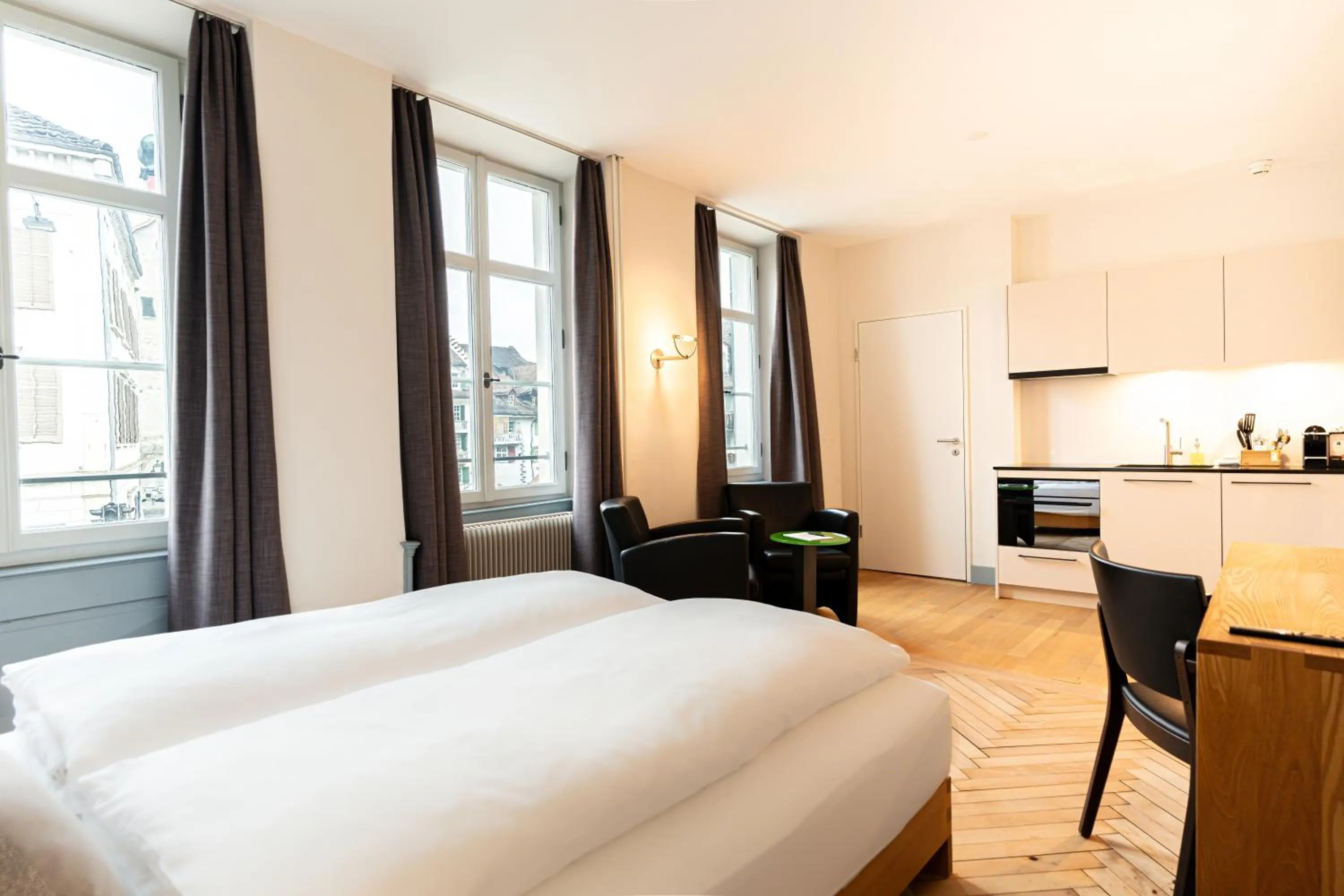 Bed in Hotel Le Lion - Self Check-in