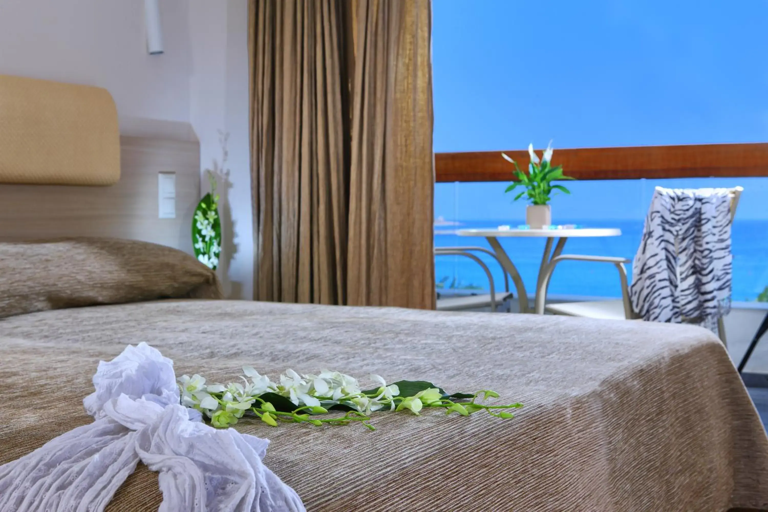 Bedroom, Bed in Sitia Beach City Resort & Spa Bedroom, Bed in Sitia Beach City Resort & Spa