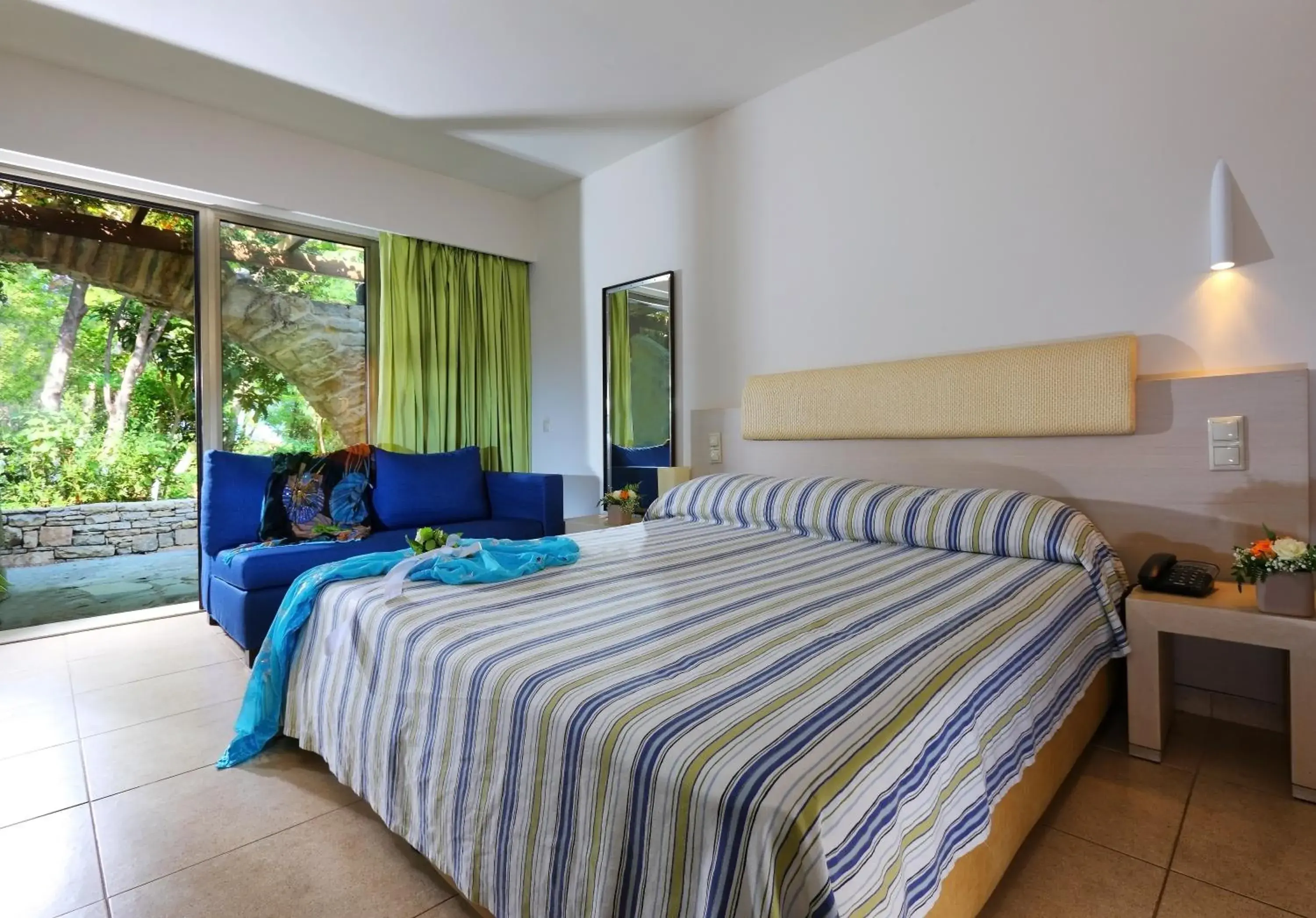 Bed in Sitia Beach City Resort & Spa Bed in Sitia Beach City Resort & Spa