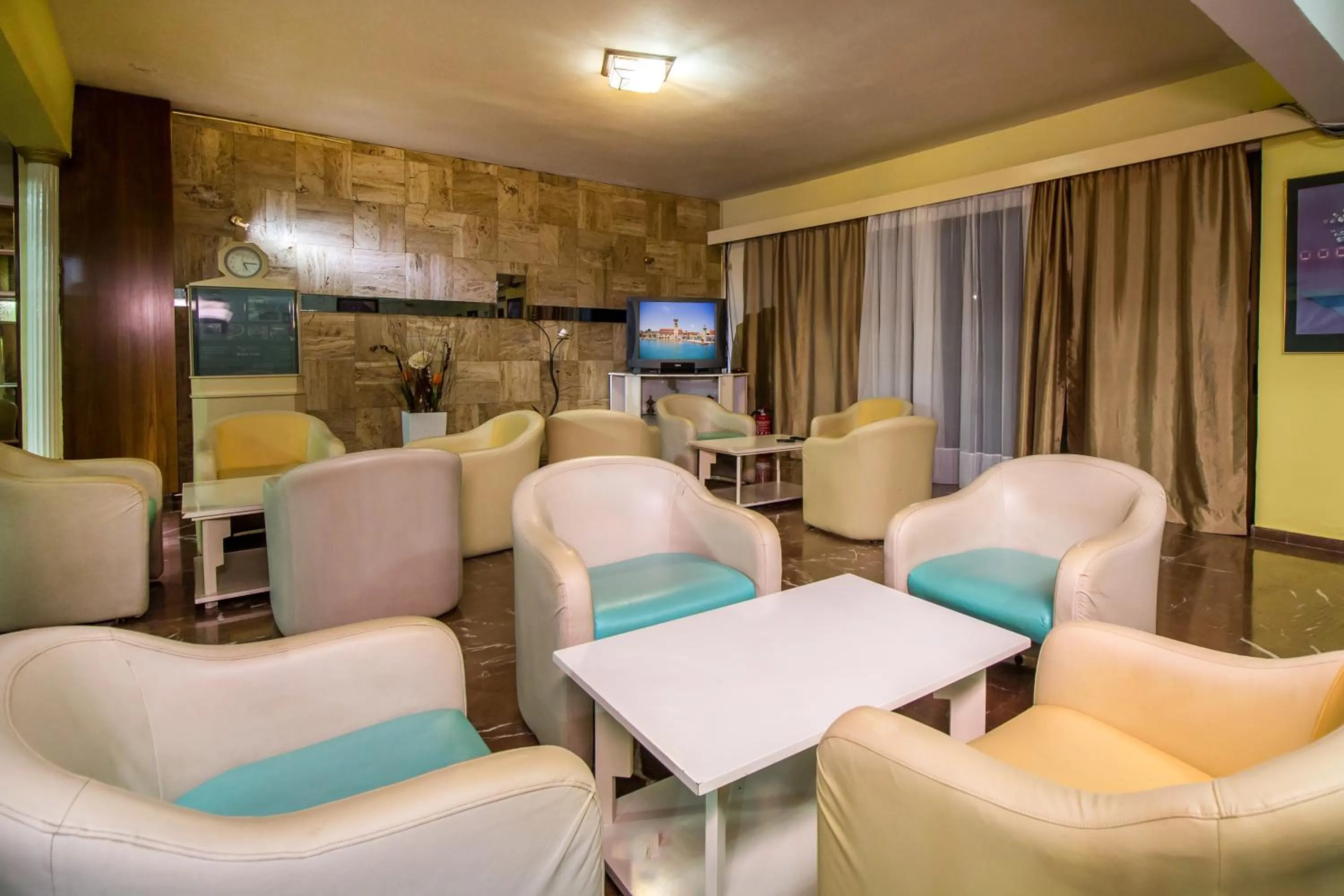 Lobby or reception in Achousa Hotel