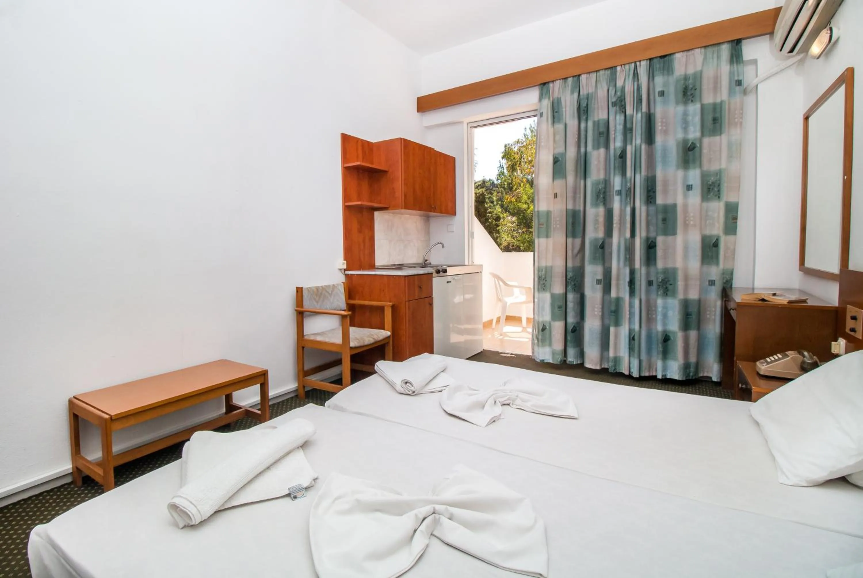 Bedroom in Achousa Hotel