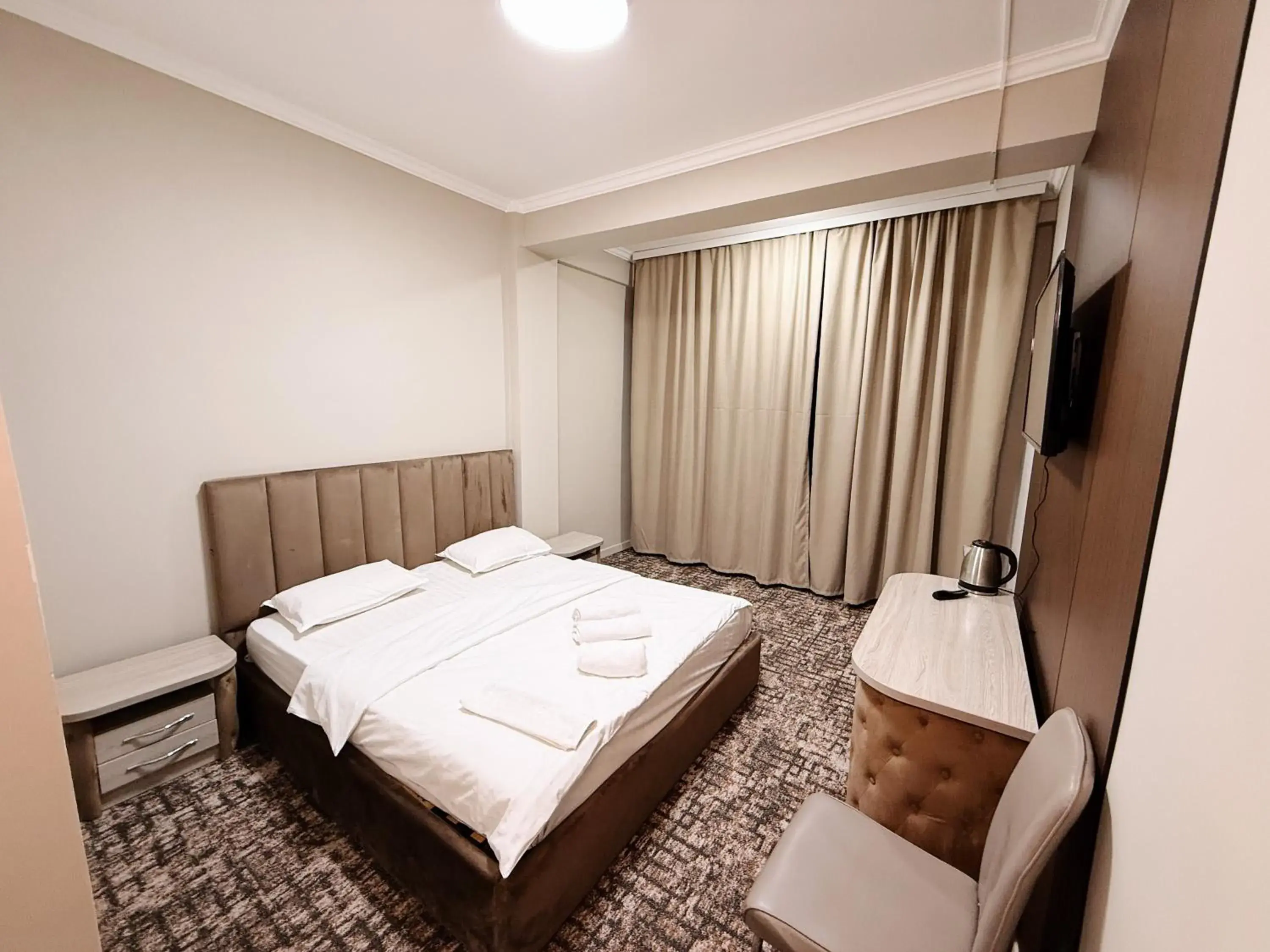 Bed in DeLuxe PLAZA Bed in DeLuxe PLAZA