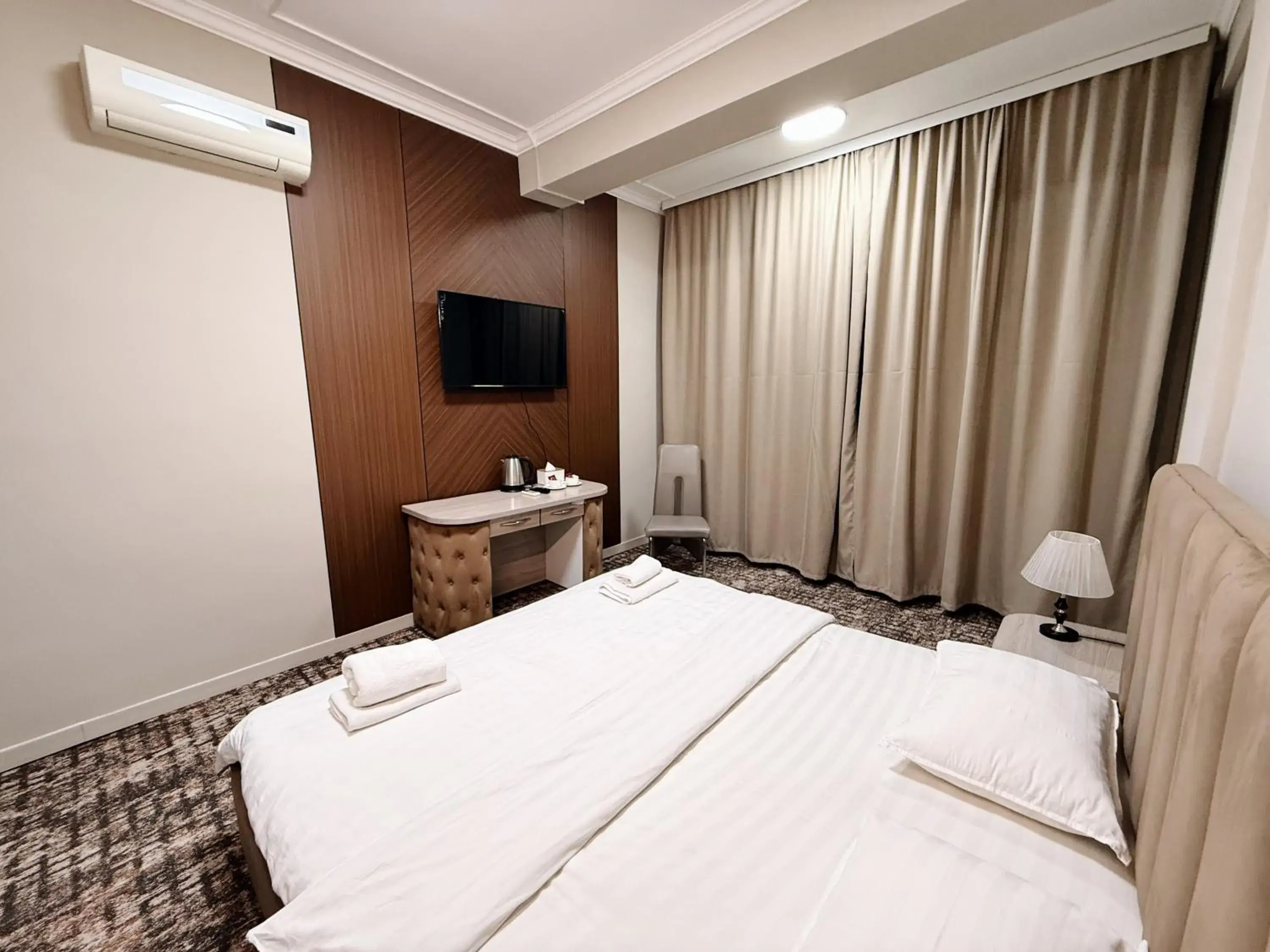 Bed in DeLuxe PLAZA Bed in DeLuxe PLAZA