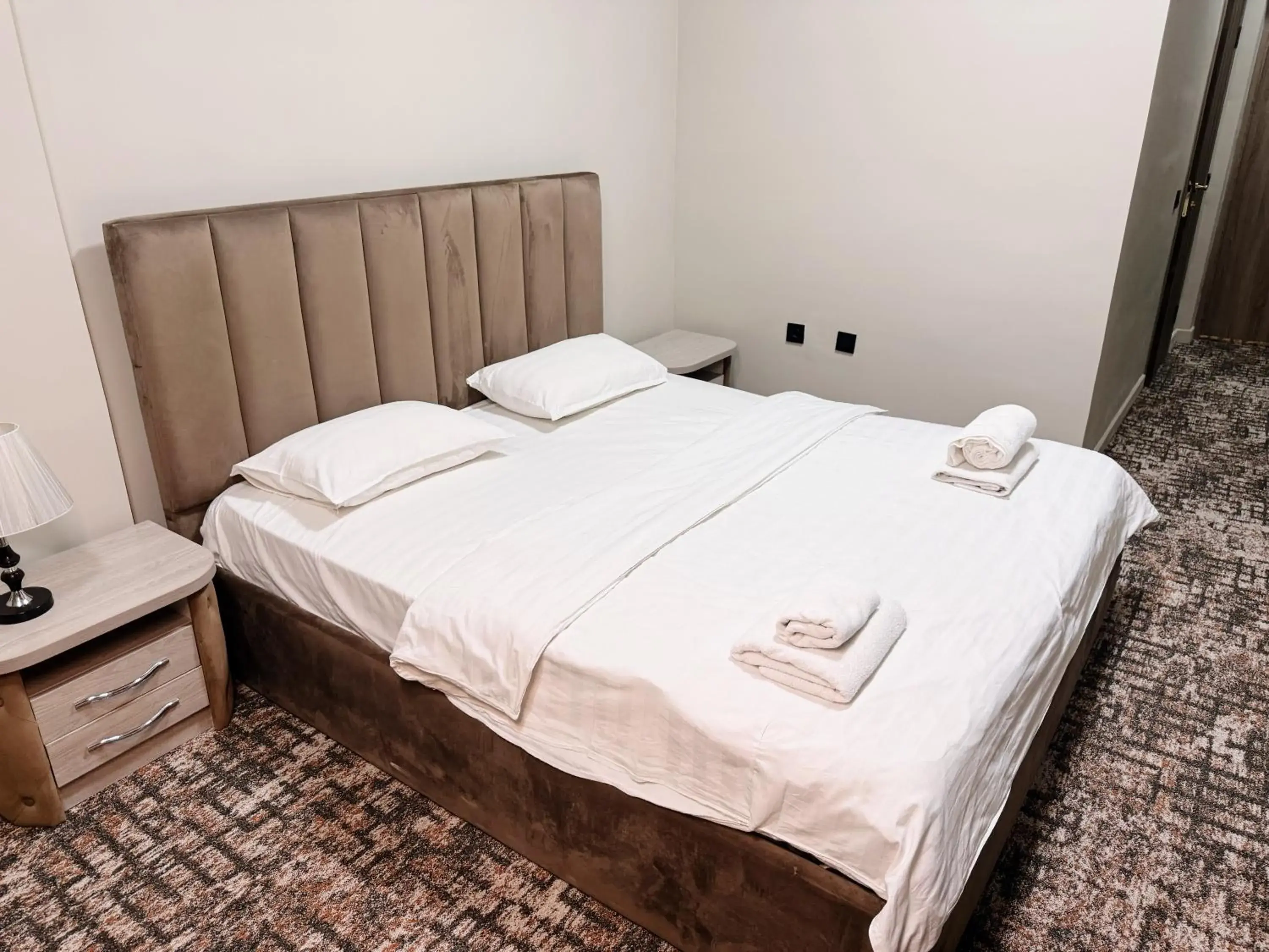 Bed in DeLuxe PLAZA Bed in DeLuxe PLAZA