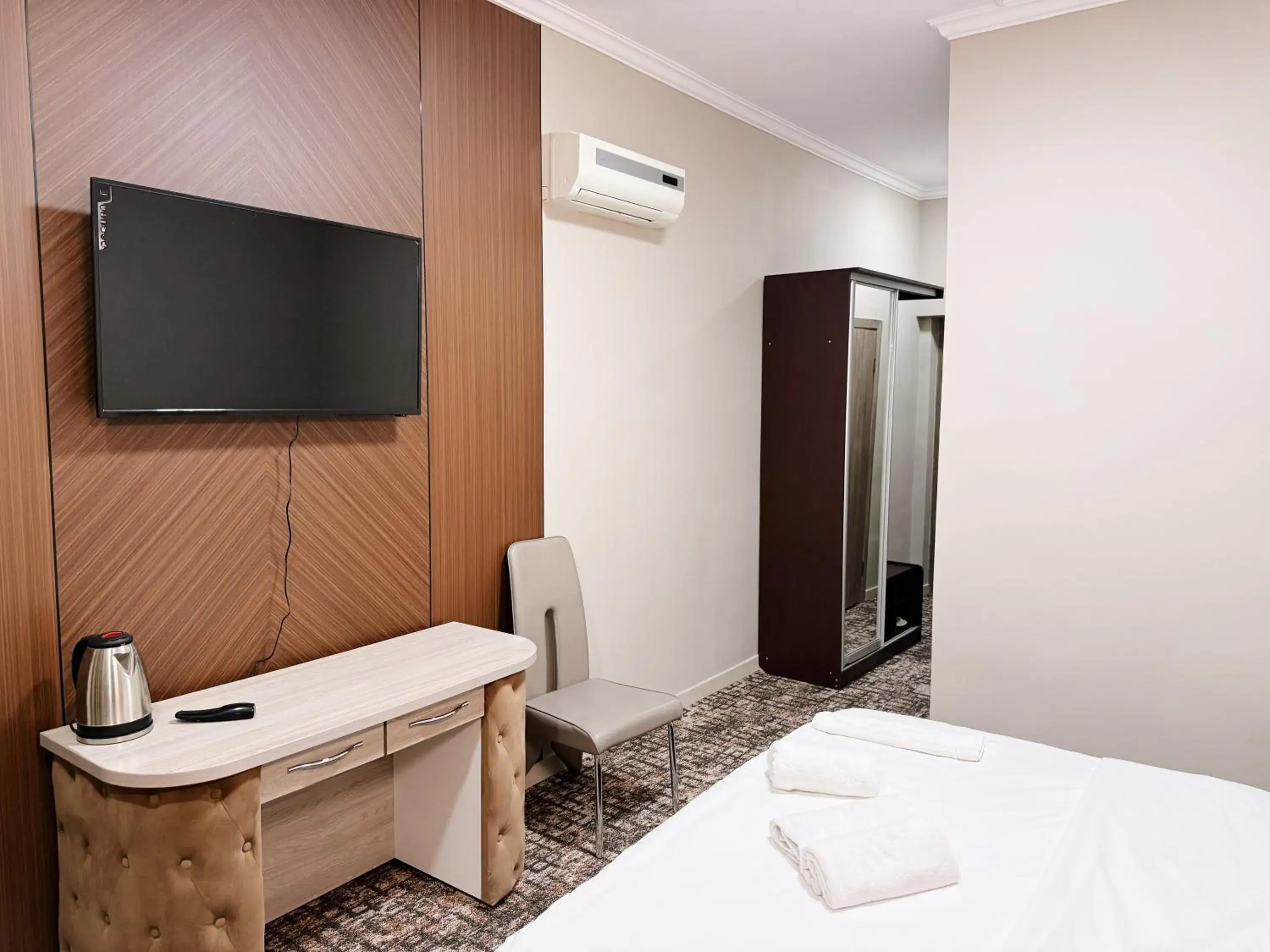 Bed in DeLuxe PLAZA Bed in DeLuxe PLAZA