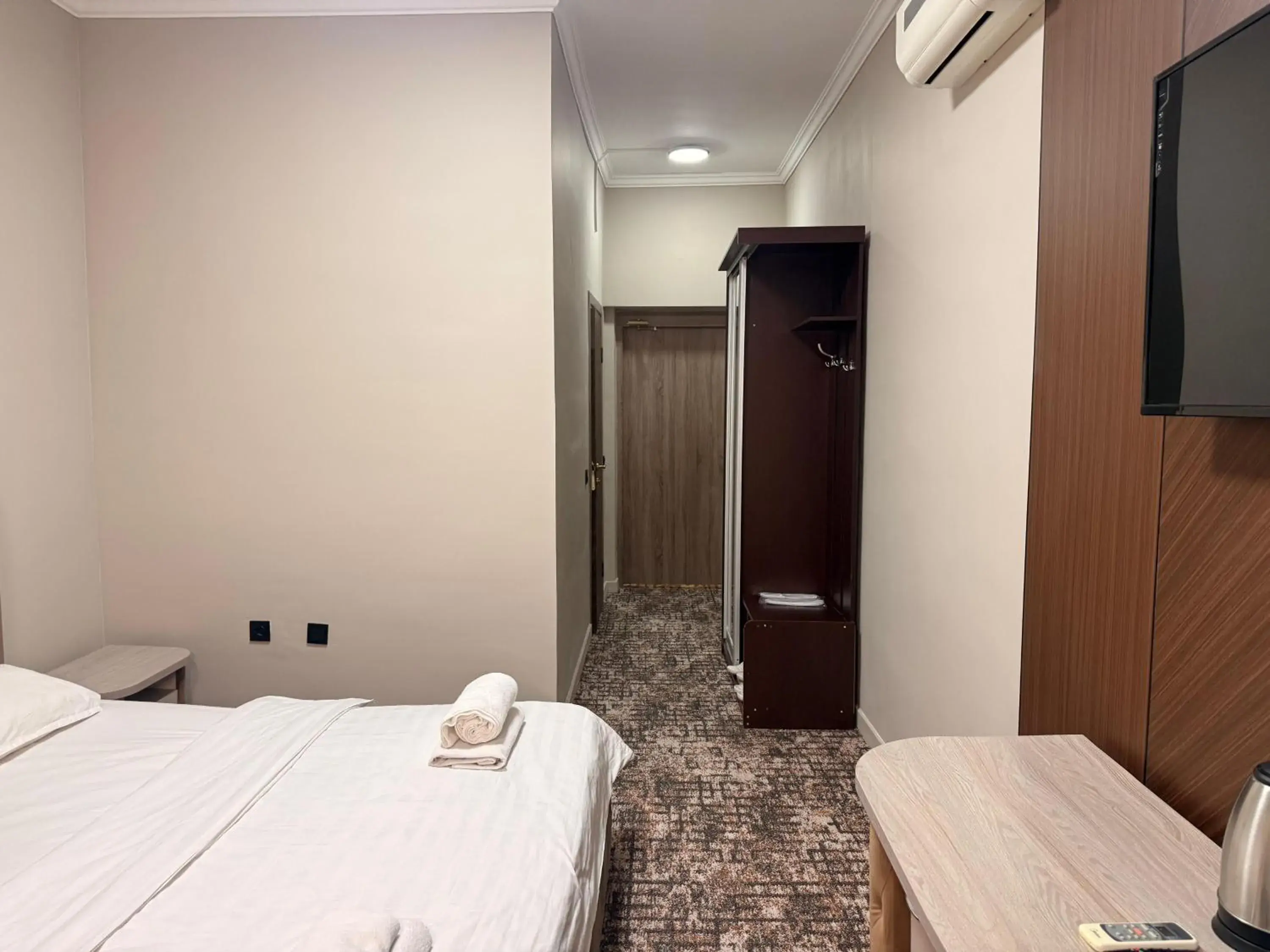 Bed in DeLuxe PLAZA Bed in DeLuxe PLAZA