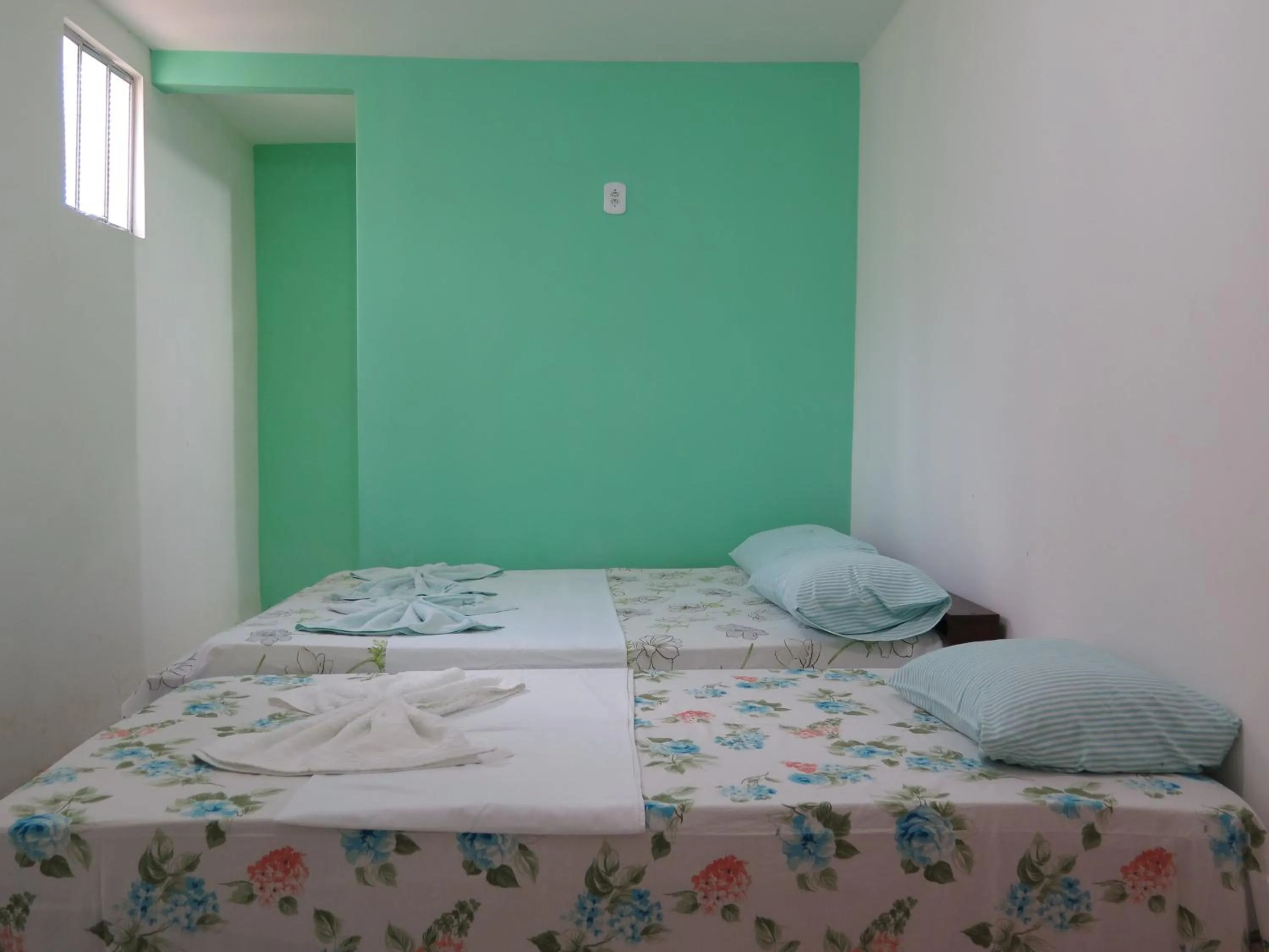 Bed in Pousada Rio Alegre