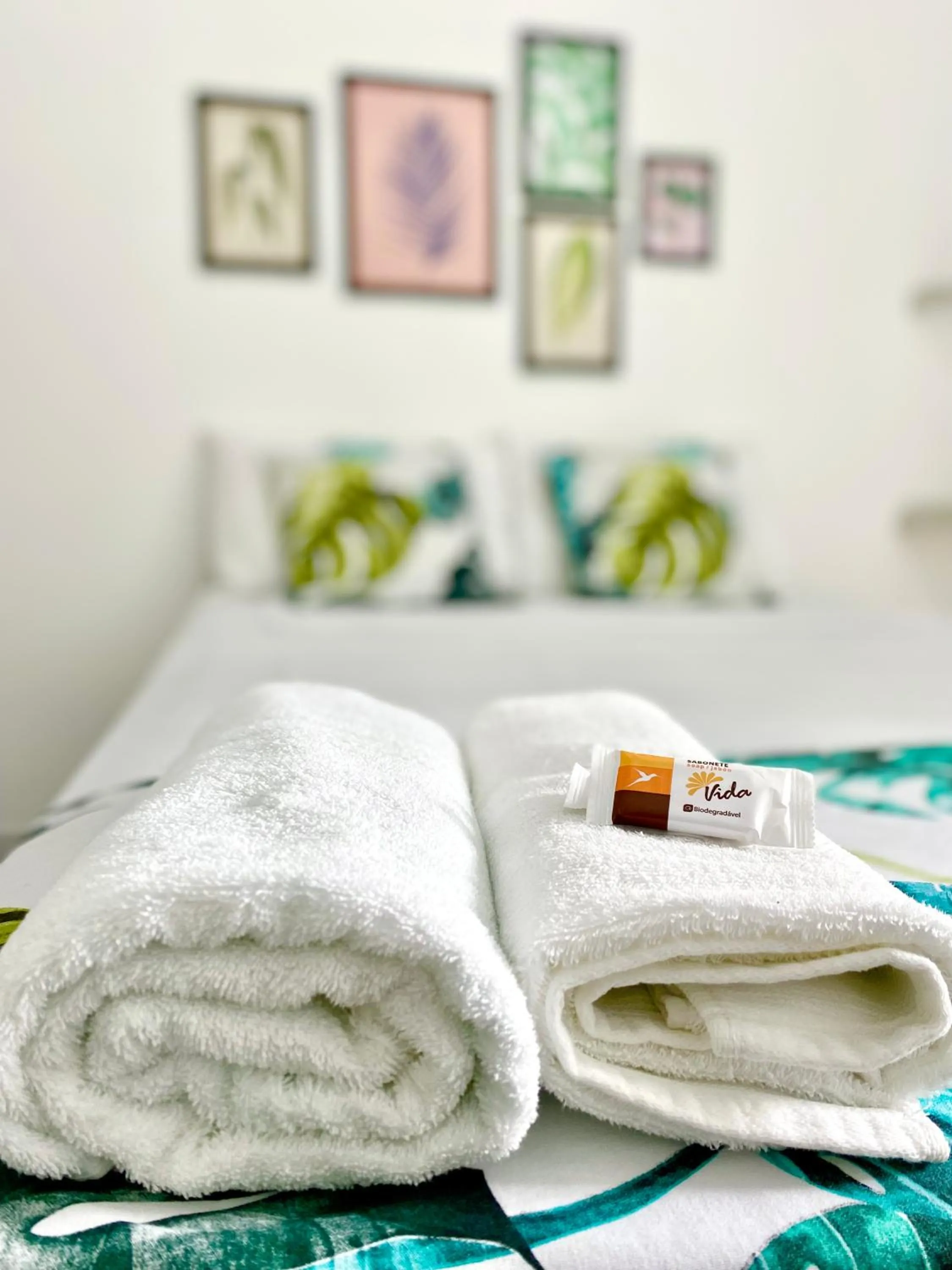 towels, Bed in Pousada Rio Alegre