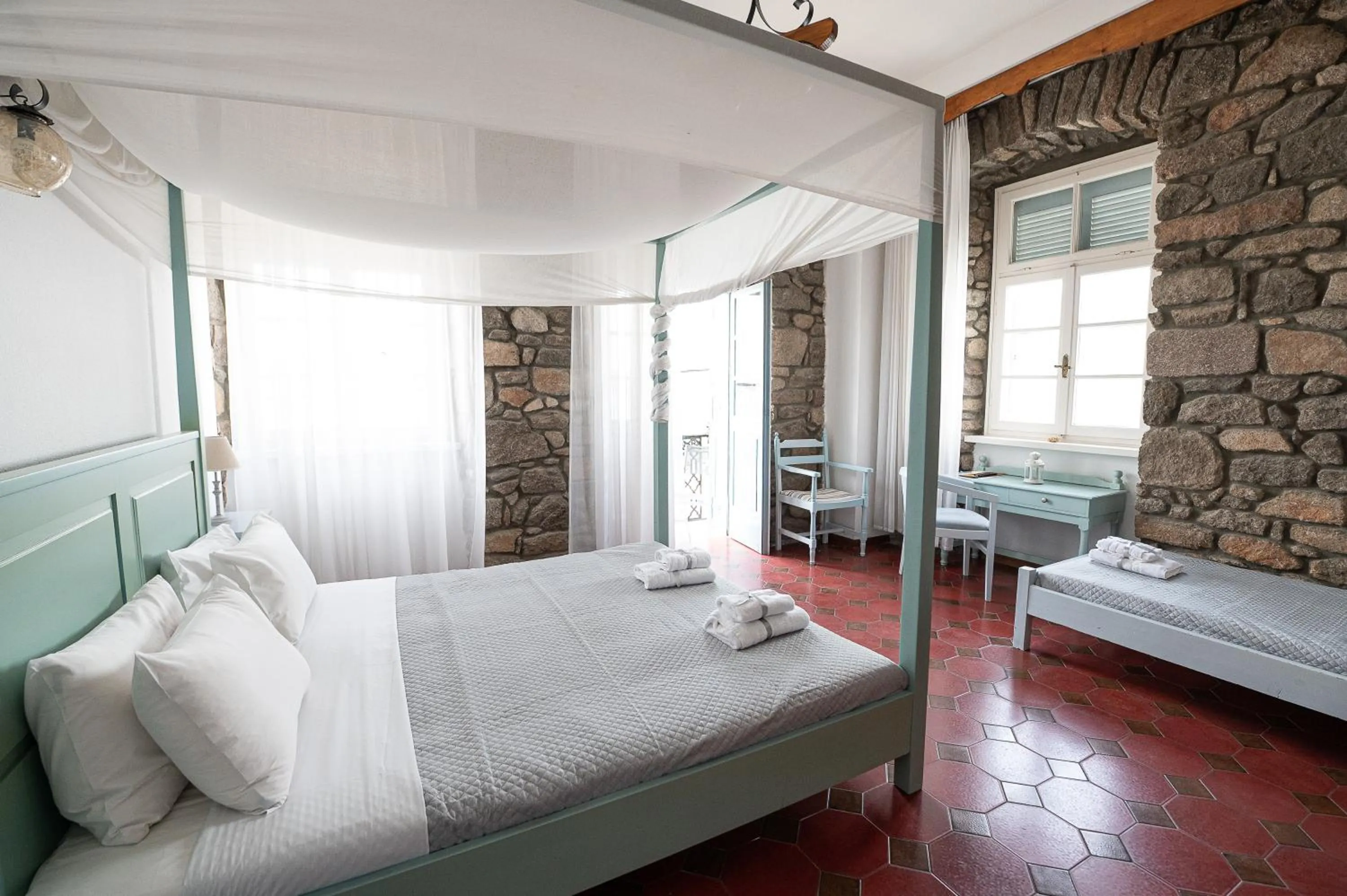 Bed in Dionysos Hotel