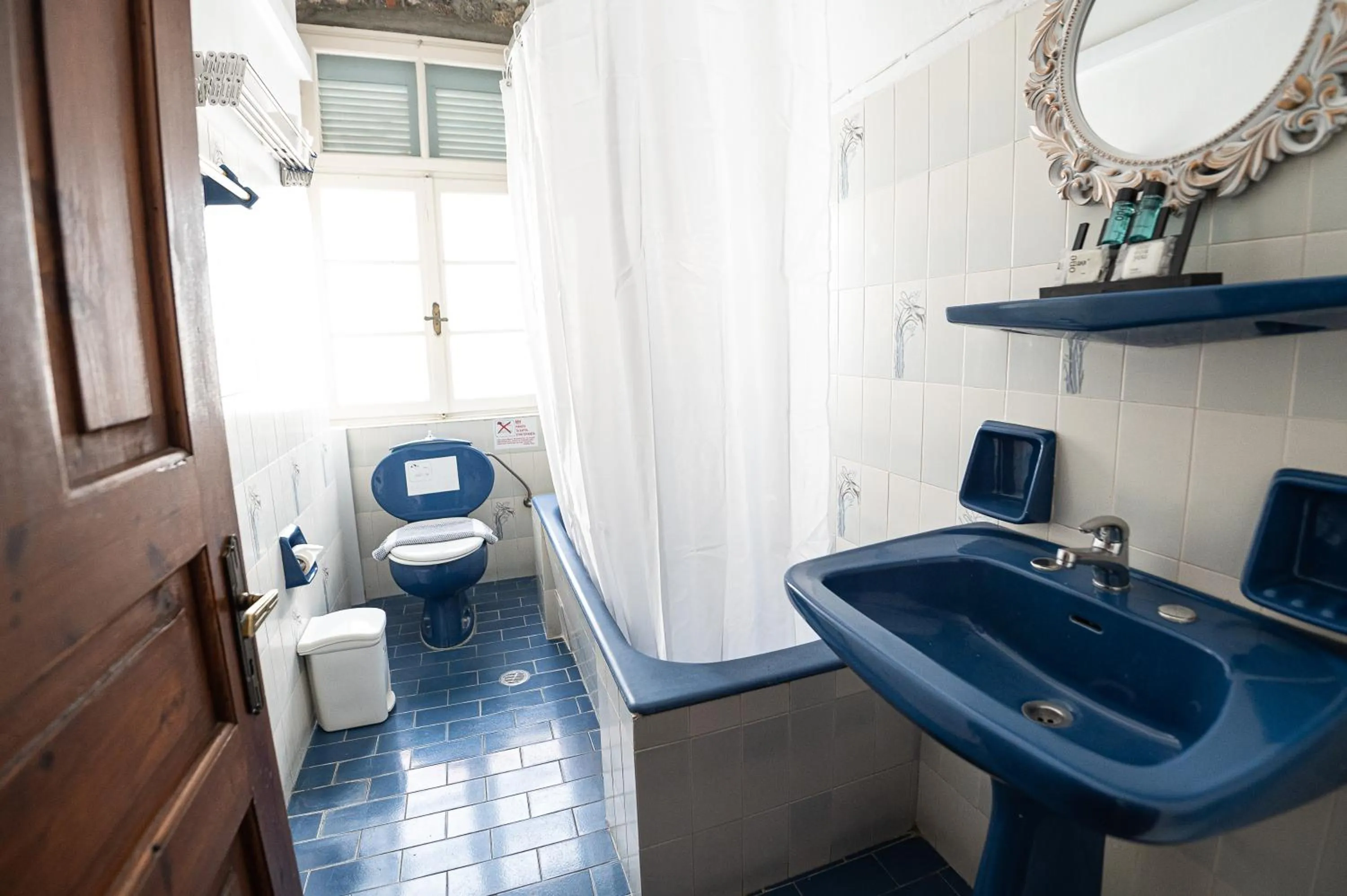 Bathroom in Dionysos Hotel