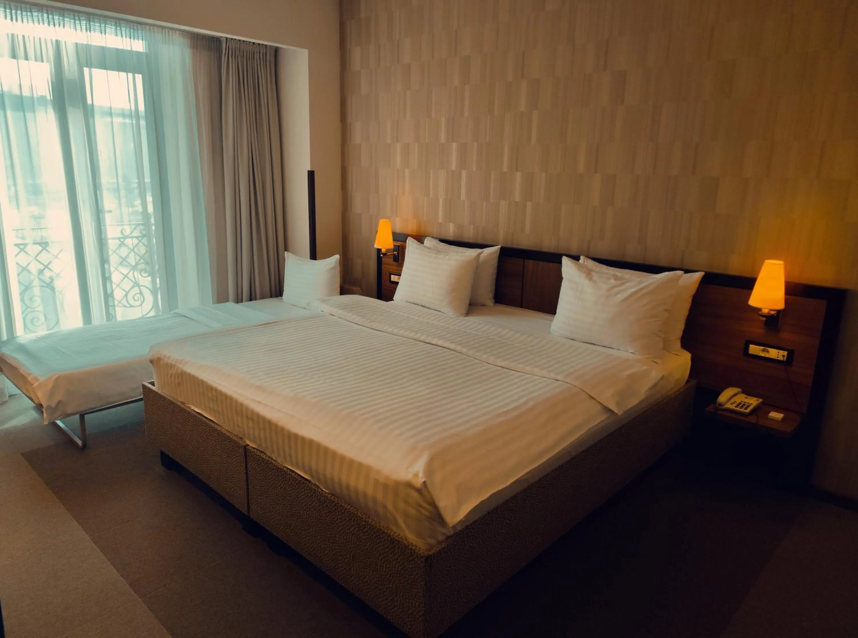 Bed in Europa Royale Bucharest